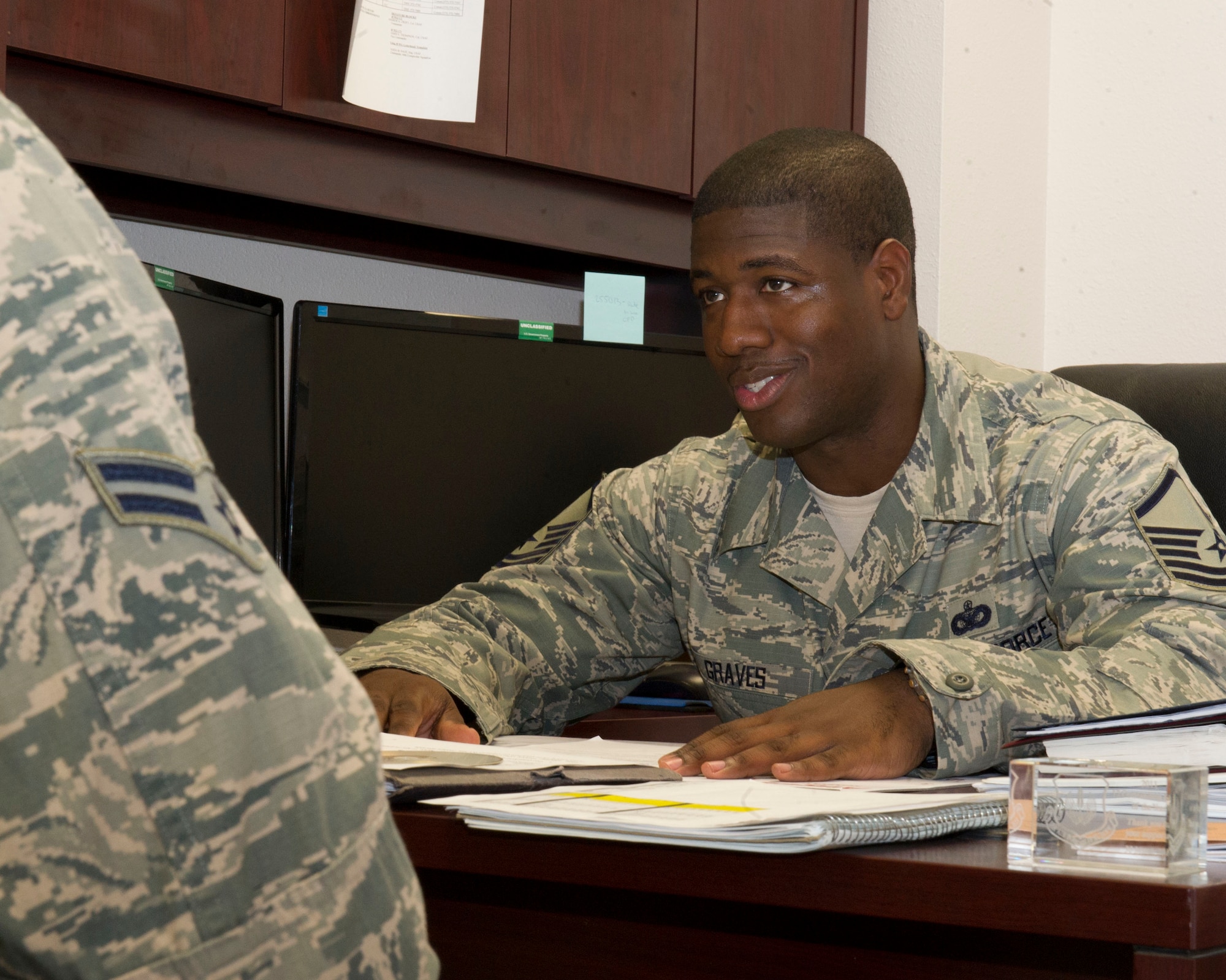 Master Robert M. Graves, 49th Wing superintendent, welcomes a new airman to Holloman Air Force Base, N.M. Sep. 18, while spreading the word of the U.S. Air Force Birthday. “The Air Force core values are the pillars upon which my life has always been based on,” said Graves. “I truly believe the core values create an atmosphere of honesty and respect which the Air Force is based upon.” On September 18, 1947 the U.S. Air Force was officially recognized as an independent military service, leaving behind its former role, the U.S. Army Air Corps. This year marks 67 years of the USAF leading the world in air superiority, space and cyberspace. “The future of our nation is forever bound up in the development of Air Power,” Brigadier General Billy Mitchell, United States Army Air Service. (U.S. Air Force photo by Staff Sgt. E’Lysia Wray/ Released) 