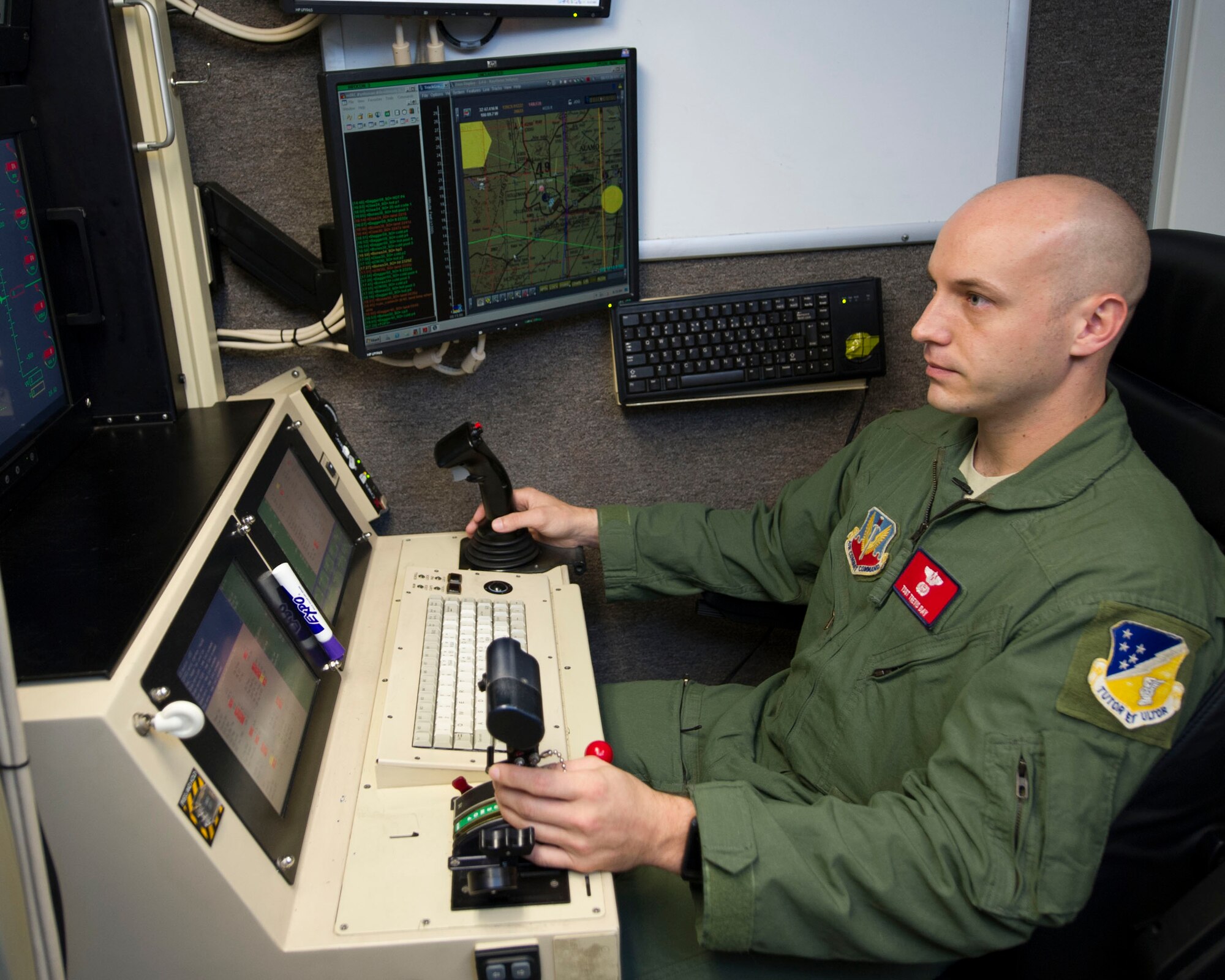 Technical Sgt. Travis Day, 29th Attack Squadron sensor operator, prepares an Air Force MQ-9 Reaper for a training mission from inside of a ground control station on Holloman Air Force Base, N.M. Sep. 18. “The core values, (Integrity first, Service before self, and Excellence in all we do), to me are an extension of every career field and their responsibility in the Air Force. Without their adherence, the solidarity of the Air Force is threatened,” said Day. On September 18, 1947 the U.S. Air Force was officially recognized as an independent military service, leaving behind its former role, the U.S. Army Air Corps. This year marks 67 years of the USAF leading the world in air superiority, space and cyberspace. “The future of our nation is forever bound up in the development of Air Power,” Brigadier General Billy Mitchell, United States Army Air Service. (U.S. Air Force photo by Staff Sgt. E’Lysia Wray/ Released) 