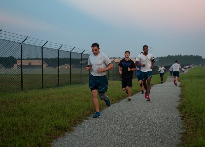 Runners make their way down a running trail during an Air Force birthday 5K run Sept. 18, 2014, at Moody Air Force Base, Ga. More than 50 people participated in the 5K. (U.S. Air Force photo by Senior Airman Jarrod Grammel/Released)
