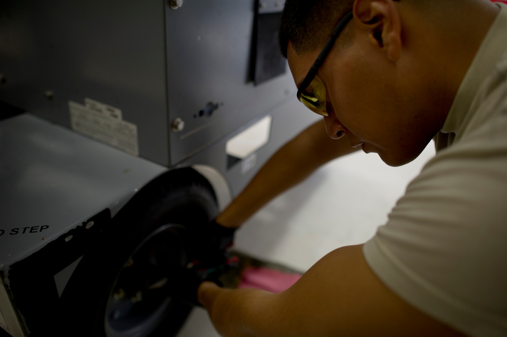 Airman 1st Class Luis Bedoya, 49th Aircraft Maintenance Squadron aerospace ground equipment technician, does his part, by ensuring equipment used for Remotely Piloted Aircraft is fully operational to support the mission of the U.S. Air Force at Holloman Air Force Base, N.M., Sept. 18. Bedoya, from Attleboro, Mass., celebrates the U.S. Air Force birthday by continuing regular operations with his fellow Airmen while listening to the radio. “I have wanted to wear this uniform since I was a kid,” said Bedoya, “I have never imagined myself anywhere else. It’s an honor to be featured as a part of this great tradition.” On September 18, 1947 the U.S. Air Force was officially recognized as an independent military service, leaving behind its former role, the U.S. Army Air Corps. This year marks 67 years of the U.S. Air Force leading the world in air superiority, space and cyberspace. "The future of our nation is forever bound up in the development of Air Power," Brigadier General Billy Mitchell, United States Army Air Service. (U.S. Air Force photo by Airman 1st Class Chase Cannon / Released).