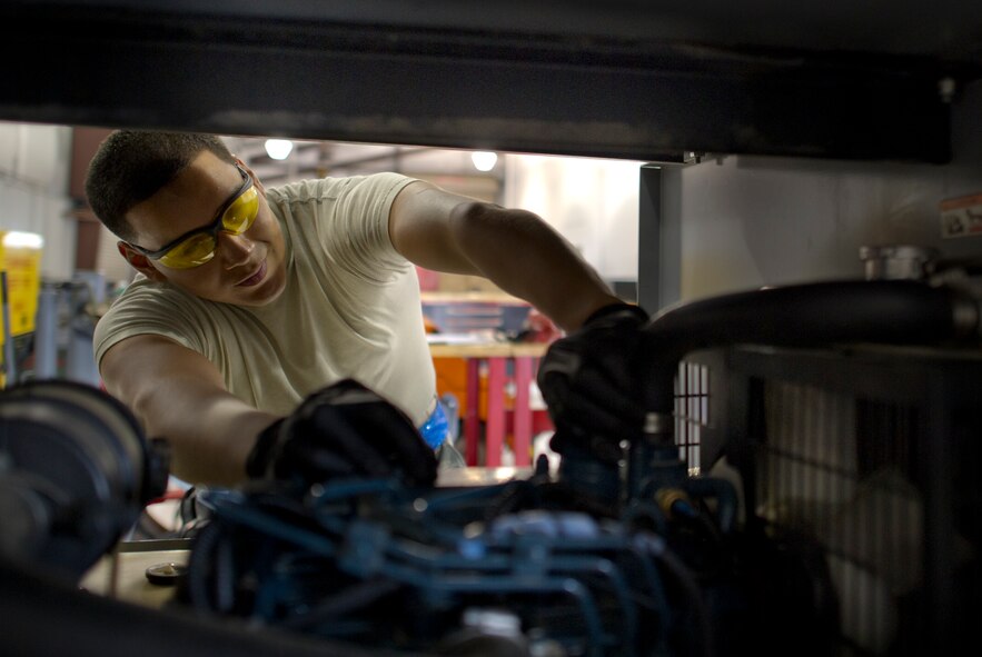Airman 1st Class Luis Bedoya, 49th Aircraft Maintenance Squadron aerospace ground equipment technician, does his part, by ensuring equipment used for Remotely Piloted Aircraft is fully operational to support the mission of the U.S. Air Force at Holloman Air Force Base, N.M., Sept. 18. Bedoya, from Attleboro, Mass., celebrates the U.S. Air Force birthday by continuing regular operations with his fellow Airmen while listening to the radio. “I have wanted to wear this uniform since I was a kid,” said Bedoya, “I have never imagined myself anywhere else. It’s an honor to be featured as a part of this great tradition.” On September 18, 1947 the U.S. Air Force was officially recognized as an independent military service, leaving behind its former role, the U.S. Army Air Corps. This year marks 67 years of the U.S. Air Force leading the world in air superiority, space and cyberspace. "The future of our nation is forever bound up in the development of Air Power," Brigadier General Billy Mitchell, United States Army Air Service. (U.S. Air Force photo by Staff Sgt. Stacy Moles / Released).