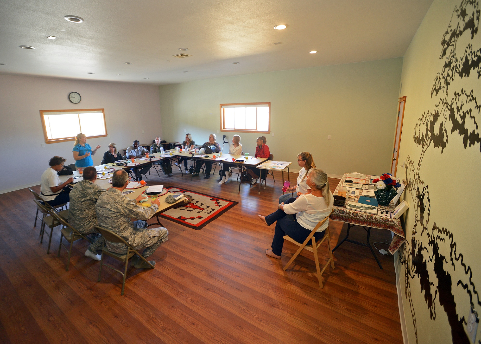 Nancy Koch-Castillo, 412th Test Wing community support coordinator, leads the Edwards Air Force Base Integrated Delivery System monthly meeting Sept. 11 during a visit to Healing Horses and Armed Forces (HHAAF), a 501c3 non-profit organization, at Rising Moon Ranch, in Tehachapi, Calif. The visit to the ranch was intended to improve the collaboration between the two helping agencies and to better understand the services offered to veterans, servicemembers and their families by HHAAF. (U.S. Air Force photo by Jet Fabara)