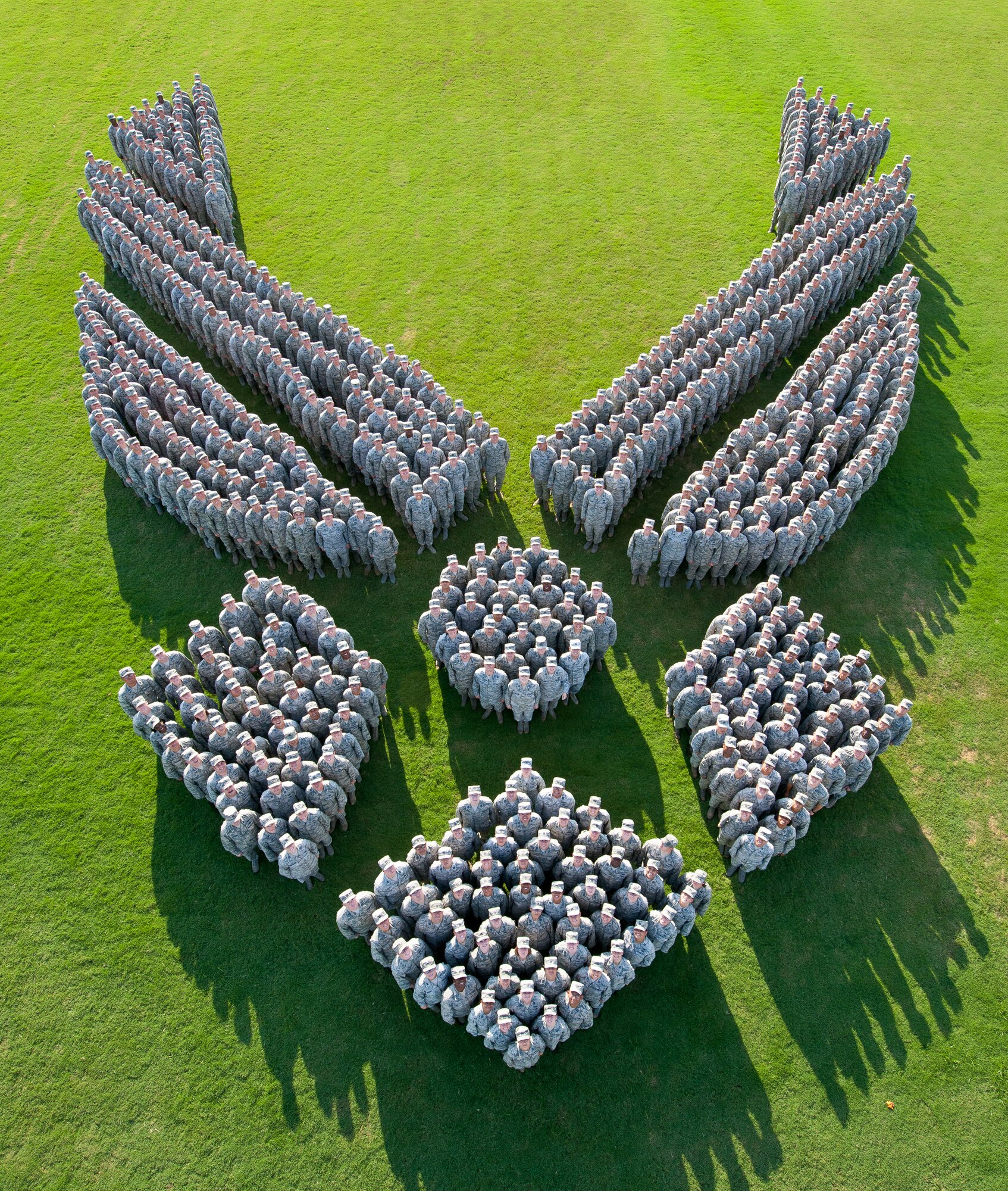 More than 650 Air Force captains from Air University's Squadron Officer School Class 14E at Maxwell Air Force Base, Ala., form-up to make an image of the Air Force Symbol in honor of the 67th Air Force Birthday. (Photo illustration by Donna Burnett)