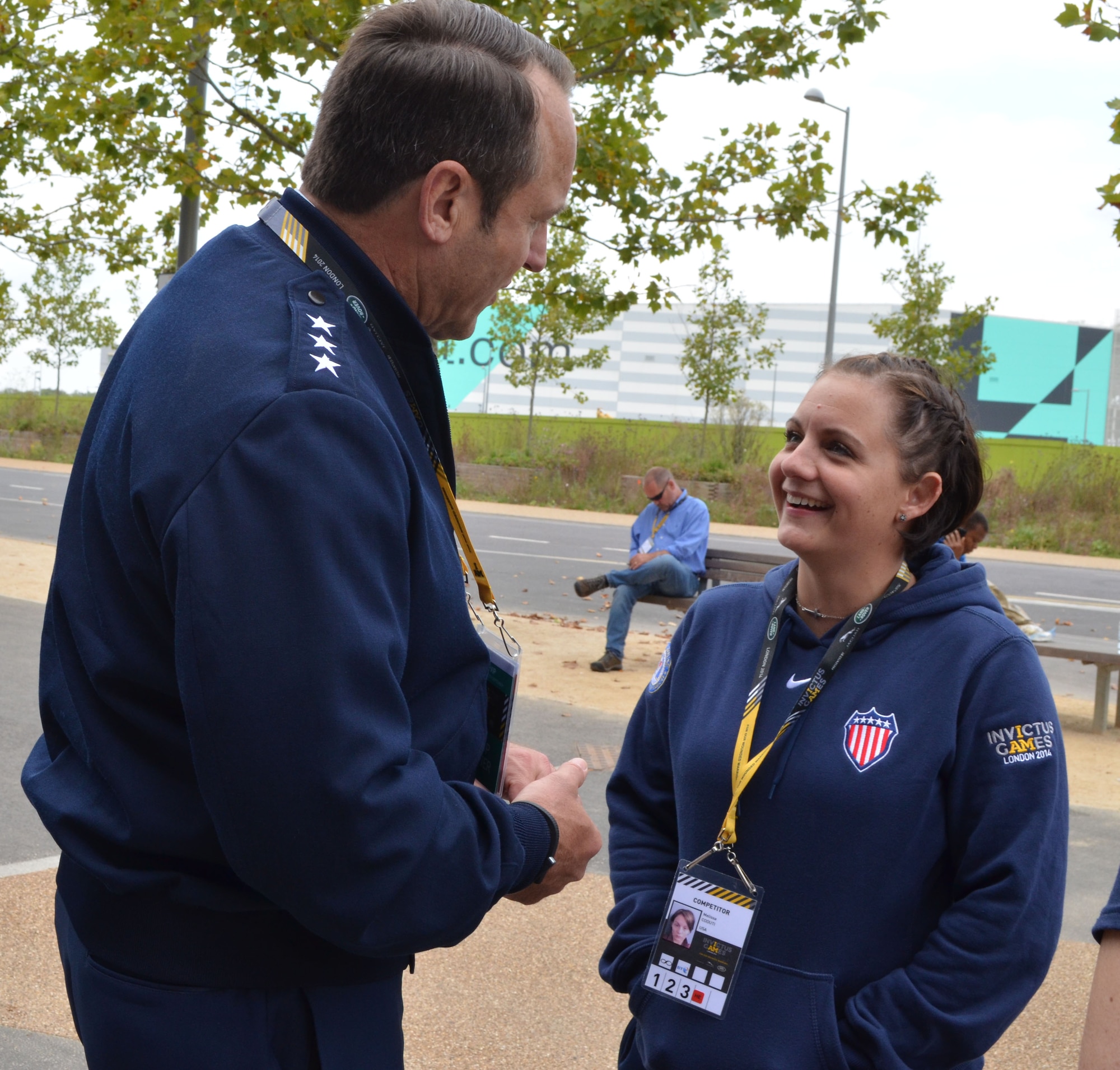U.S. Air Force Retired Staff Sgt. Melissa Coduti discusses her Invictus Games events with Lt. Gen. Tom Jones, U.S. Air Forces in Europe-Air Forces Africa vice commander at Queen Elizabeth Olympic Park in London. The Invictus Games was an international Paralympic-style event designed to spotlight sacrifices made by wounded warriors and their families, and cultivate healthy competition in the realm of adaptive sport. (U.S. Air Force photo by Capt. Carolyn Glover/Released)