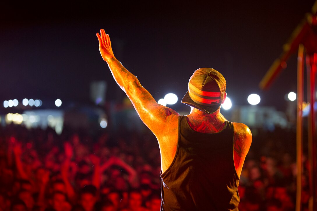 Sonny Sandoval, the vocalist for the band P.O.D., sings Sept. 13 during Hansen Fest. The band’s performance boosted morale and provided a great chance for free entertainment for all the festival attendees, according to Stephen Hatfield, the Marine Corps Community Services Okinawa coordinator for Camp Hansen. “This is one of the best events on the island and is another great way for the service members and (community members) to interact,” said Hatfield, from Boston, Massachusetts. (U.S. Marine Corps photo by Lance Cpl. Ryan C. Mains/Released)