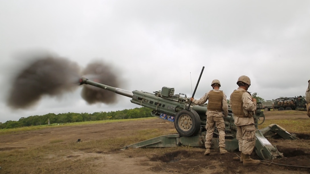 Marines fire a high-explosive round from an M777A2 lightweight 155 mm howitzer during live-fire artillery training Sept. 2 at the Yausubetsu Maneuver Area in Hokkaido as part of Artillery Relocation Training Program 14-2.  The Yausubetsu Maneuver Area is the largest training area available to U.S. Marines in the ARTP and affords the opportunity to fire at greater distances than other training areas. The Marines are with Battery B, 1st Battalion, 12th Marine Regiment, currently assigned to 3rd Battalion, 12th Marines, 3rd Marine Division, III Marine Expeditionary Force. (U.S. Marine Corps photo by Sgt. Matthew Manning/Released)