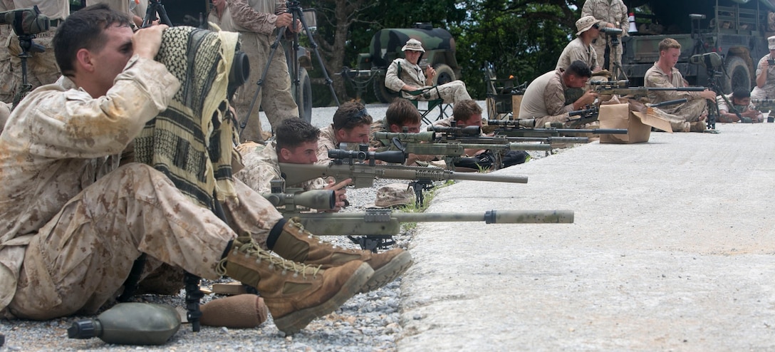 U.S. Marines fire M40A5 sniper rifles Aug. 17 at the Central Training Area in Okinawa, Japan. The course of fire introduced the Marines to the M40A5 sniper rifle and prepared them for the Scout Sniper Basic Course. The M40A5 rifle is a bolt-action sniper rifle with a muzzle velocity of 2,550 feet per second and an effective firing range of up to 900 meters. The Marines are with various units assigned to 3rd Marine Division, III Marine Expeditionary Force. 