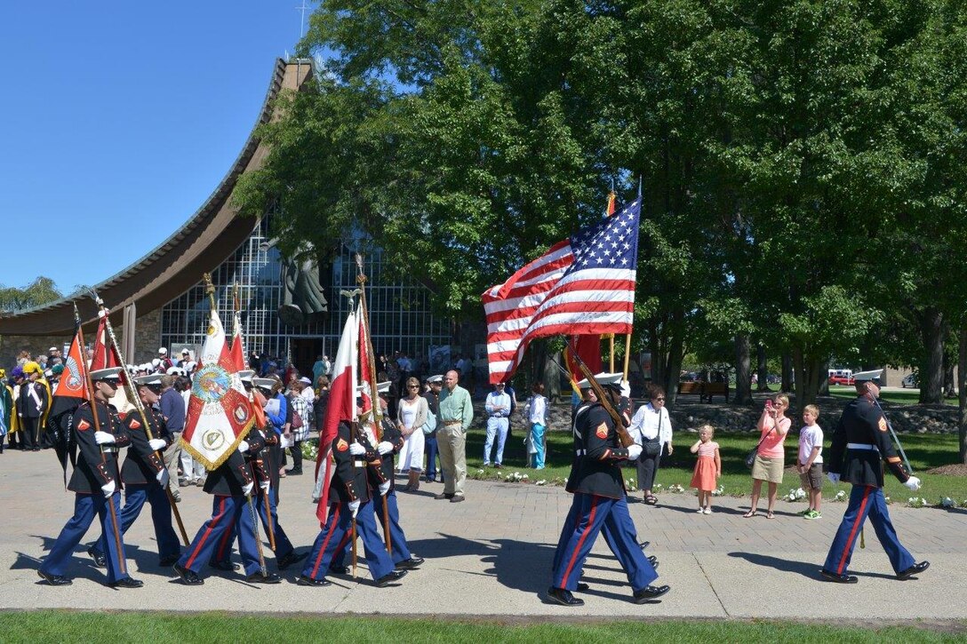 Marines with Recruiting Station Detroit and 1st Battalion, 24th Marine Regiment, presented various national and military colors during a 1939 commemoration at The Polish Mission of the Orchard Lake Schools Sept. 7, 2014. In honor of the 75th Anniversary of the outbreak of WWII in Poland, the Marines presented and retired the colors before and after mass, followed by a slow march to Katyń/Smolensk monument. (U.S. Marine Corps courtesy photos by Marcin Chumiecki/Released)