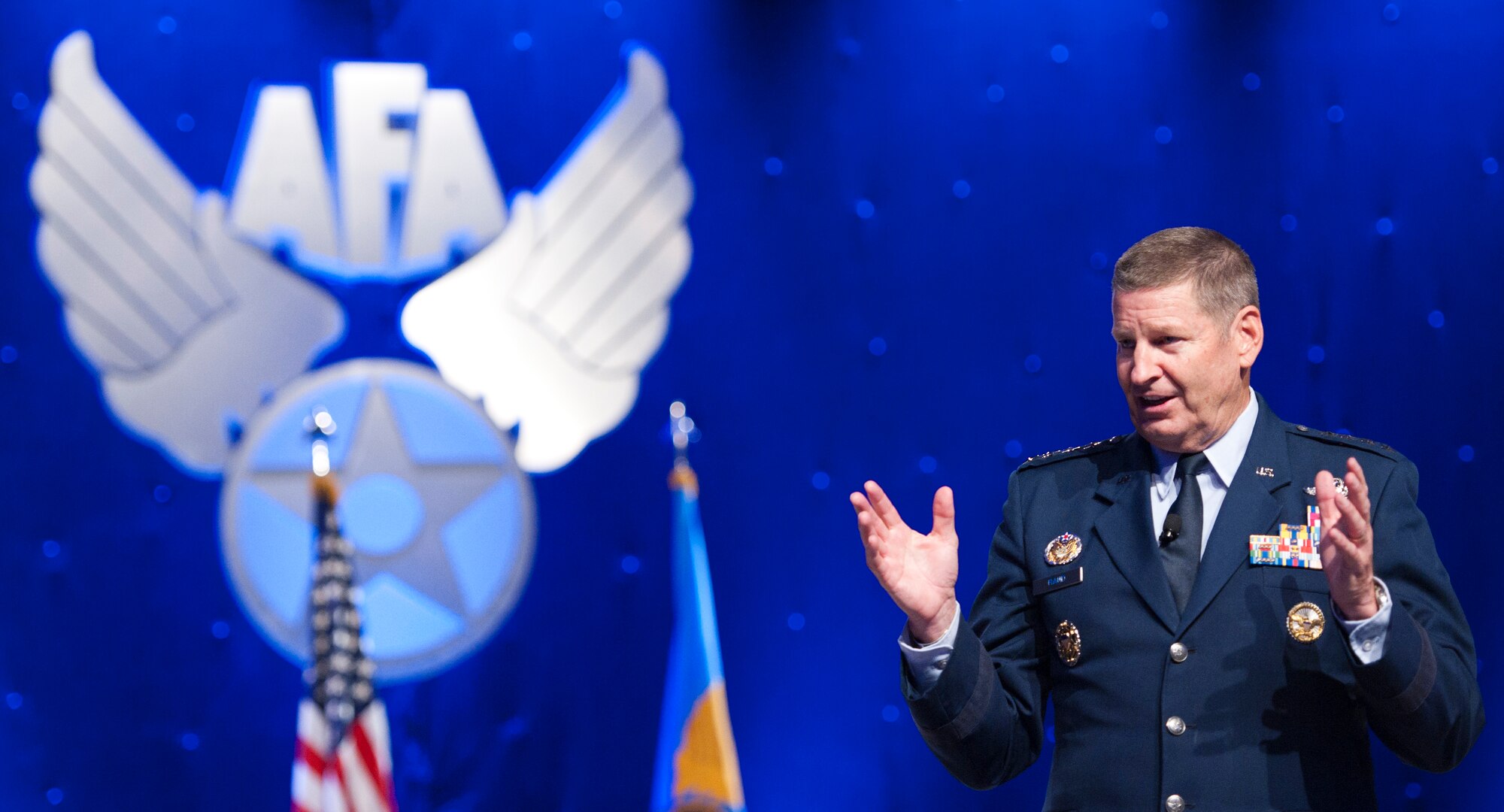 Gen. Robin Rand talks to attendees about Air Education and Training Command updates during the 2014 Air Force Association's Air & Space Conference and Technology Exposition Sept. 16, 2014, in Washington D.C. Rand is the commander of Air Education and Training Command. (U.S. Air Force photo/Staff Sgt. Anthony Nelson Jr)