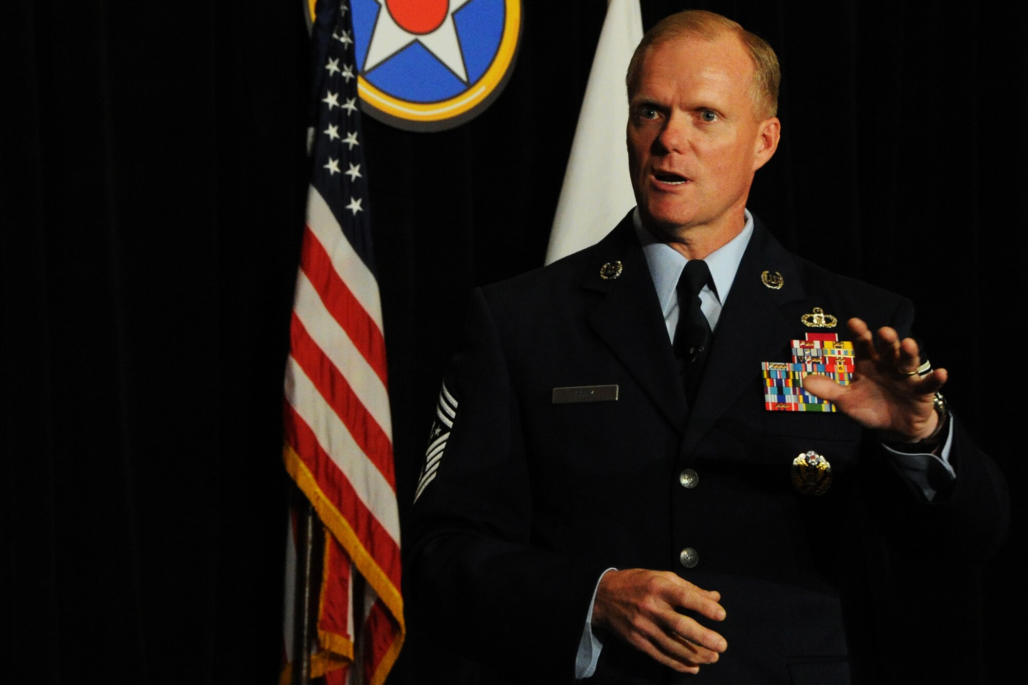 Chief Master Sgt. of the Air Force James A. Cody speaks to Airmen concerning future changes for the Air Force during the 2014 Air Force Association Air & Space Conference Sept. 17, 2014 at the Gaylord National Convention Center Washington, D.C. Cody provides direction for the enlisted force and represents their interests, as appropriate, to the American public, and to those in all levels of government. (U.S. Air Force photo/Staff Sgt. Matt Davis)