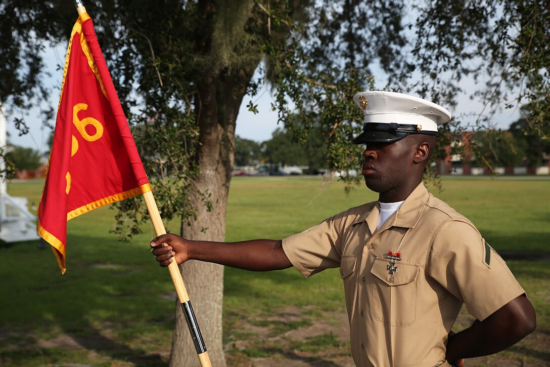 Pfc. Lorvens L. Ostreal, honor graduate of platoon 1066, awaits graduation at Marine Corps Recruit Depot Parris Island, S.C., Sept. 19, 2014. Jeswald, a Lauderhill, Fla. native, was recruited by Staff Sgt. George A. Bognar III, a recruiter from Permanent Contact Station Fort Lauderdale, Recruiting Station Fort Lauderdale. Recruit training signifies the transformation of a civilian to a United States Marine. Upon graduation, the newly-minted Marines will receive ten days of leave before attending the School of Infantry East, Camp Gieger, N.C. The Marines will be trained in basic infantry skills to ensure Marines are combat-ready. (U.S. Marine Corps Photo by Cpl. John-Paul Imbody)