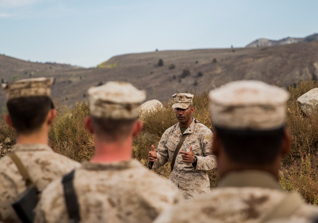 U.S. Marine Lt. Col. Wilfred Rivera congratulates his Marines after completing Mountain Exercise 2014 aboard Marine Corps Mountain Warfare Training Center in Bridgeport, Calif., Sept. 8, 2014. Rivera is the commanding officer for CLB-15. The training ensures the Marines are prepared to operate in mountainous terrain if the need arises while deployed with the 15th Marine Expeditionary Unit. Marines with 3rd Battalion, 1st Marine Regiment will become the 15th MEU’s ground combat element in October. (U.S. Marine Corps photo by Sgt. Emmanuel Ramos/Released)