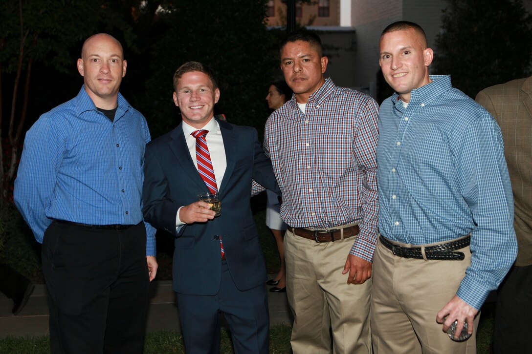 Medal of Honor recipient Cpl. Kyle Carpenter attends a reception prior to the final evening parade of the season at Marine Barracks Washington, D.C., on Aug. 29, 2014. (U.S. Marine Corps photo by Sgt. Marionne T. Mangrum)