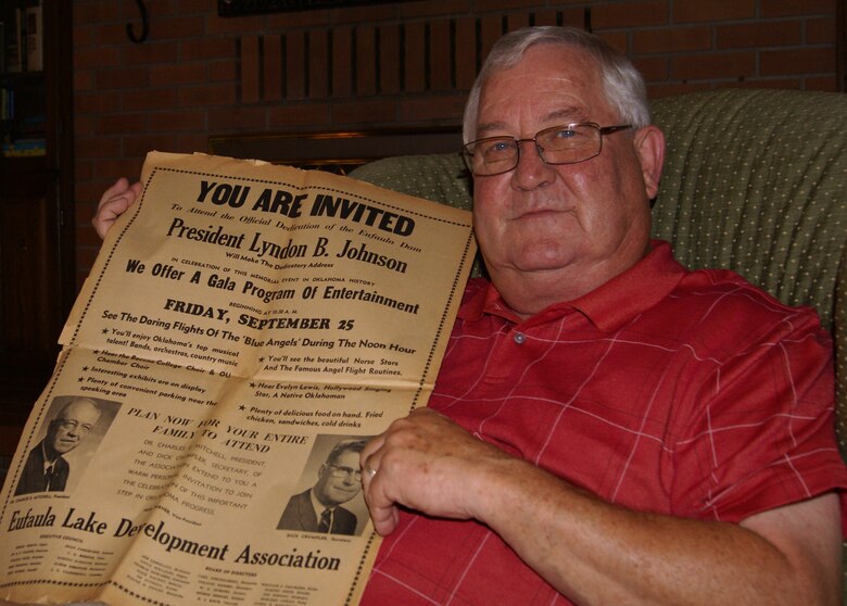 Charles Crumpler holds a copy of the newspaper advertisement taken out by the Eufaula Lake Development Association just before the Eufaula Dam opening ceremony. Richard Crumpler, served as the ELDA president and secretary. He is pictured in the newspaper photo next to Charles' hand. Crumpler. Charles will deliver the same invocation written and read by Harold Baird during the opening ceremony, when he leads the prayer during the 50th Anniversary Celebration of Lake Eufaula, Sept. 25.