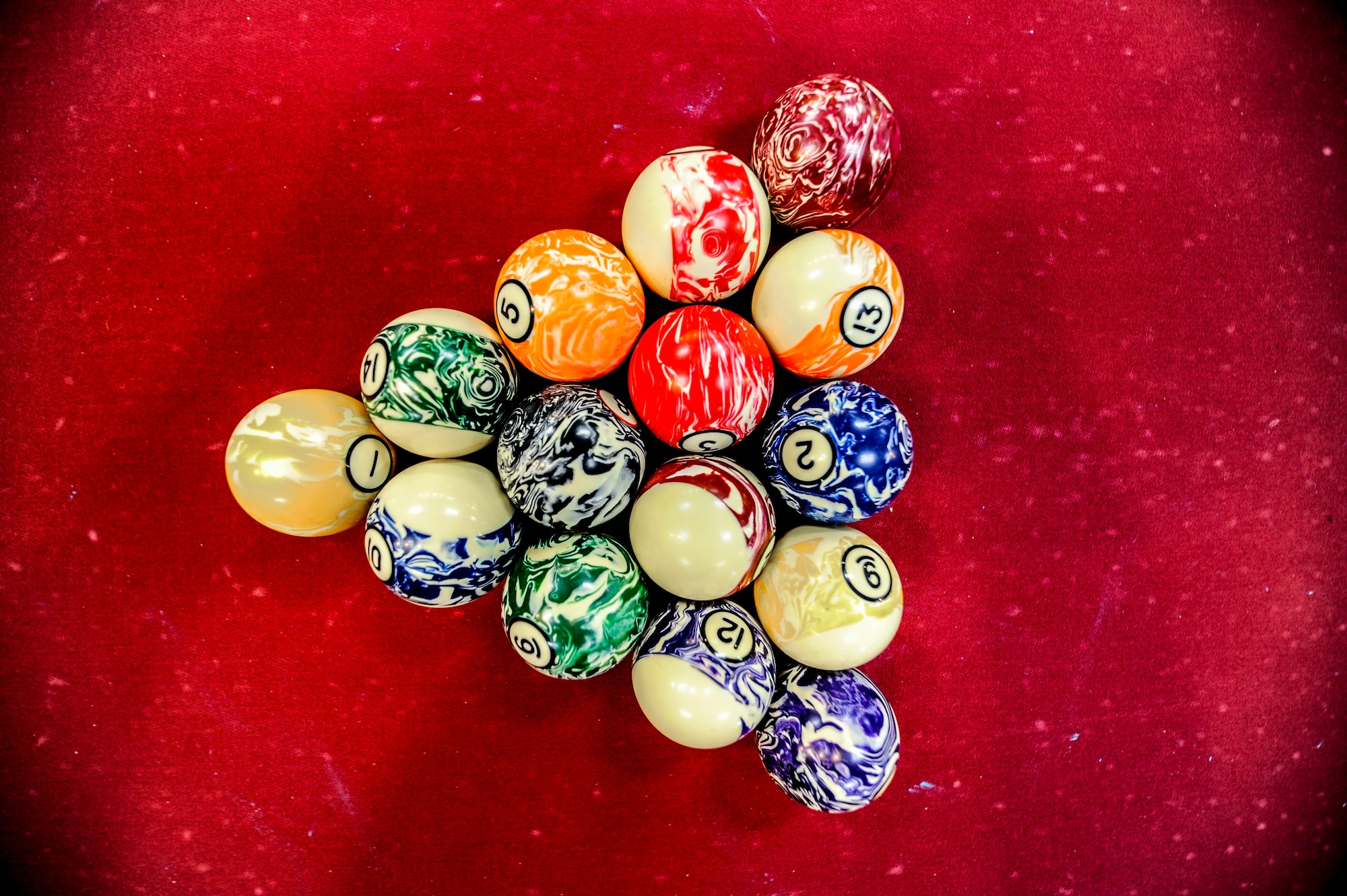 Pool balls are racked before a match at the Landing Zone on Hurlburt Field, Fla., Sept. 11, 2014. Hurlburt Airman’s Voice hosted a pool tournament to help Airmen and their families relax from the fast pace Special Operations mission. (U.S. Air Force photo/Senior Airman Christopher Callaway) 