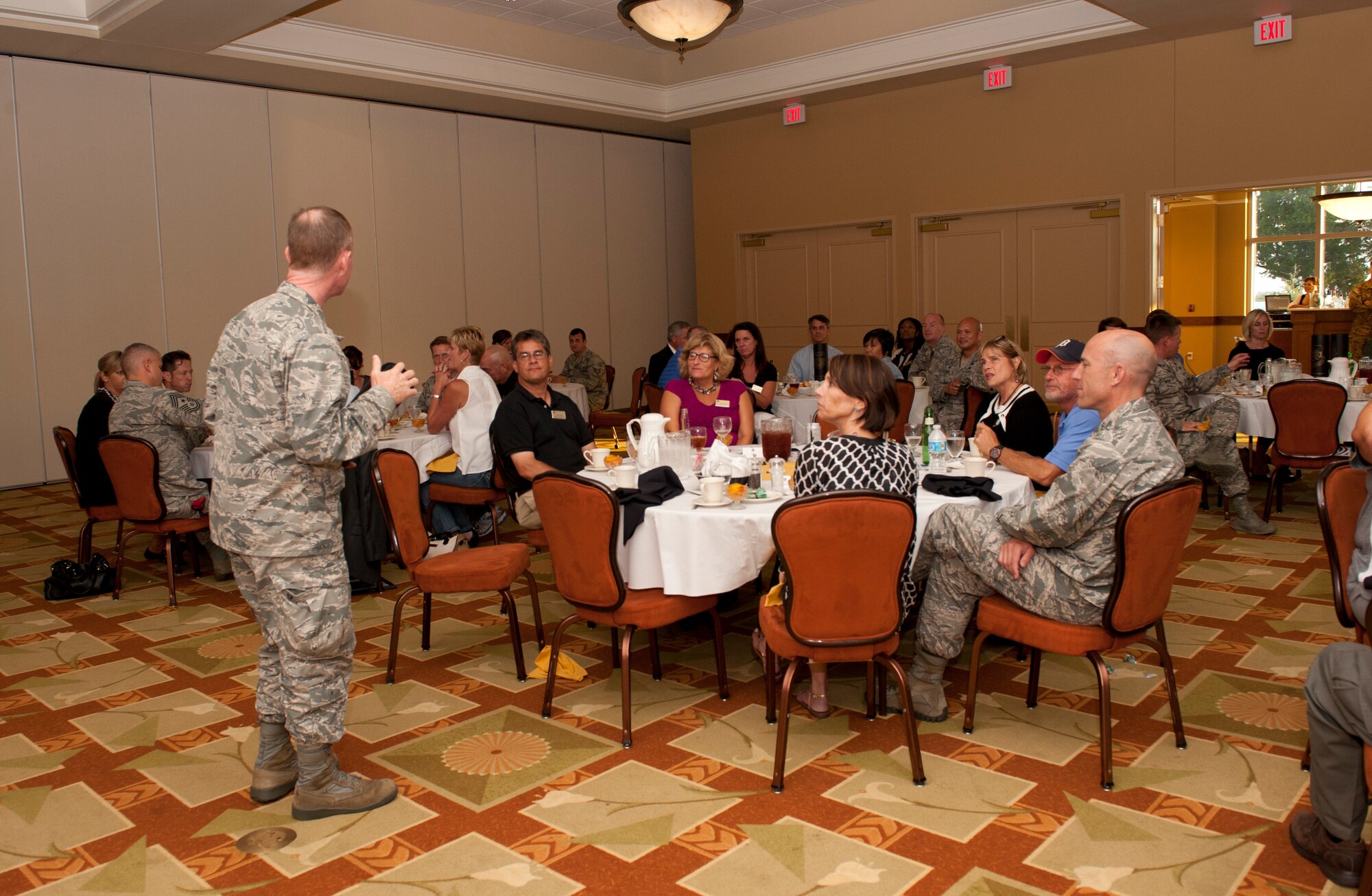 Col. Bill West, 1st Special Operations wing commander, speaks during an Honorary Commanders banquet at the Soundside Club on Hurlburt Field, Fla., Sept. 19, 2014. Eleven new community leaders were inducted as Honorary Commanders during the event. (U.S. Air Force photo/Senior Airman Krystal M. Garrett)