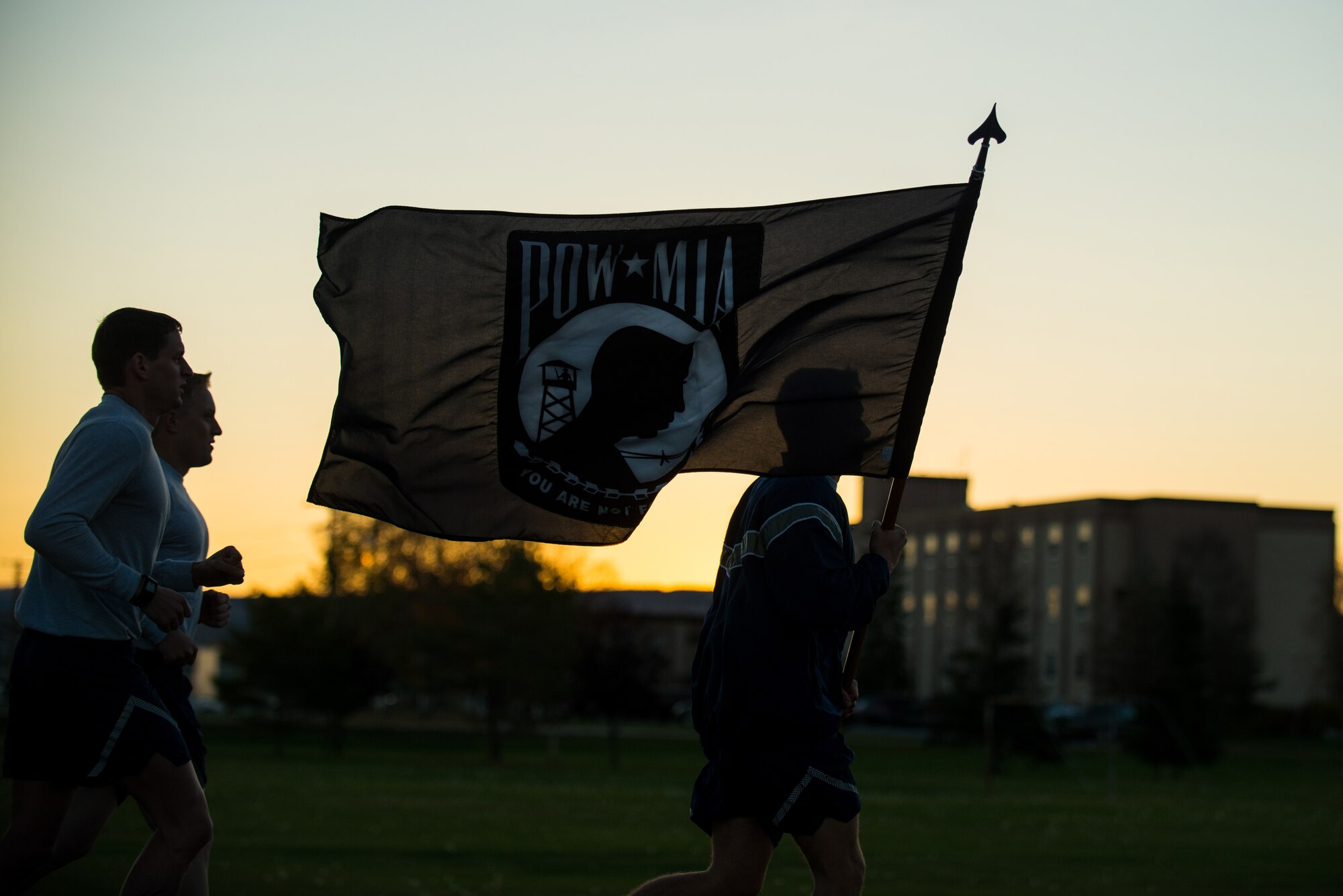 Icemen participate in a POW/MIA 24-hour vigil run during National POW/MIA Recognition Day, at Eielson Air Force Base, Alaska, Sept. 18, 2014.  Annually the third Friday of September each year is observed across the United States as National POW/MIA Recognition Day to honor prisoners of war and the missing as well as their families and highlights the government's commitment to account for them. (U.S. Air Force photo by Tech. Sgt. Joseph Swafford/Released)
