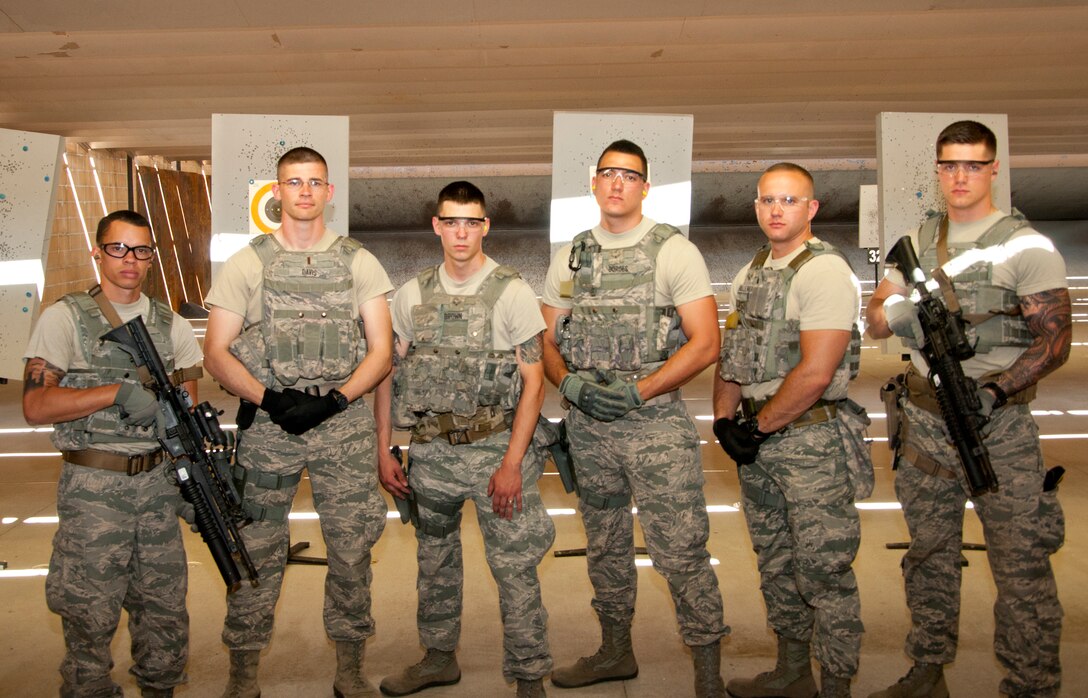 The 90th Security Forces Group 2014 Global Strike Challenge team: Senior Airman Richard Purrier, 90th SFG Tactical Response Force; 2nd Lt. Jeffery Davis, 90th Missile Security Forces Squadron; Senior Airman Gerald Brown, 790th MSFS; Airman Riley Borges, 790th MSFS; Staff Sgt. Lance Bollenberg, 90th MSFS; and Senior Airman Colton Schoenegge, 90th SFG TRF. (U.S. Air Force photo by Senior Airman Jason Wiese)