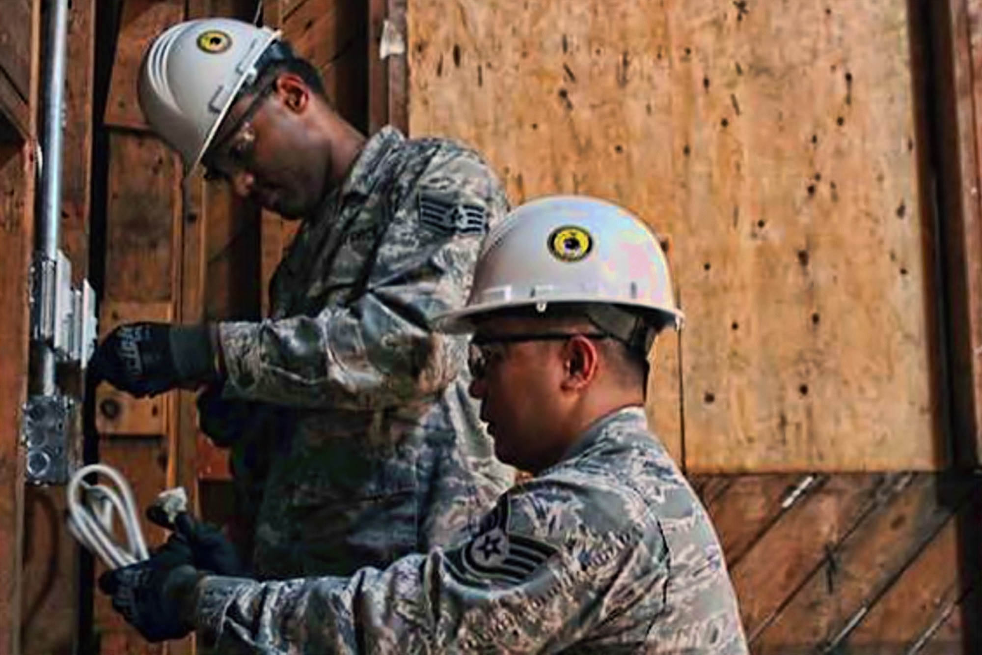 Reservists from the 446th Civil Engineer Squadron here, handle some cables to renovate one of the base's old chapels, and convert it into an Environmental Education and Conference Center. Airmen from the 446th CES worked in tandem with JBLM Public Works and the 176th Engineers from the Washington National Guard to complete the project by the end of the year. (Northwest Guardian)