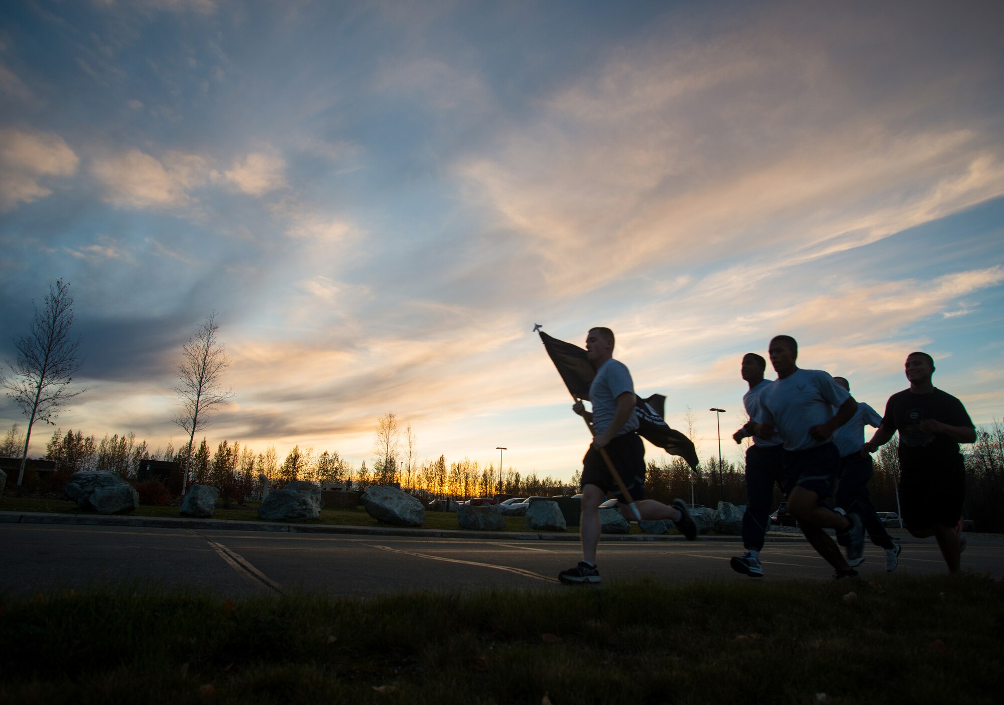 Icemen participate in a POW/MIA 24-hour vigil run during National POW/MIA Recognition Day, at Eielson Air Force Base, Alaska, Sept. 18, 2014.  Annually the third Friday of September each year is observed across the United States as National POW/MIA Recognition Day to honor prisoners of war and the missing as well as their families and highlights the government's commitment to account for them. (U.S. Air Force photo by Tech. Sgt. Joseph Swafford/Released)
