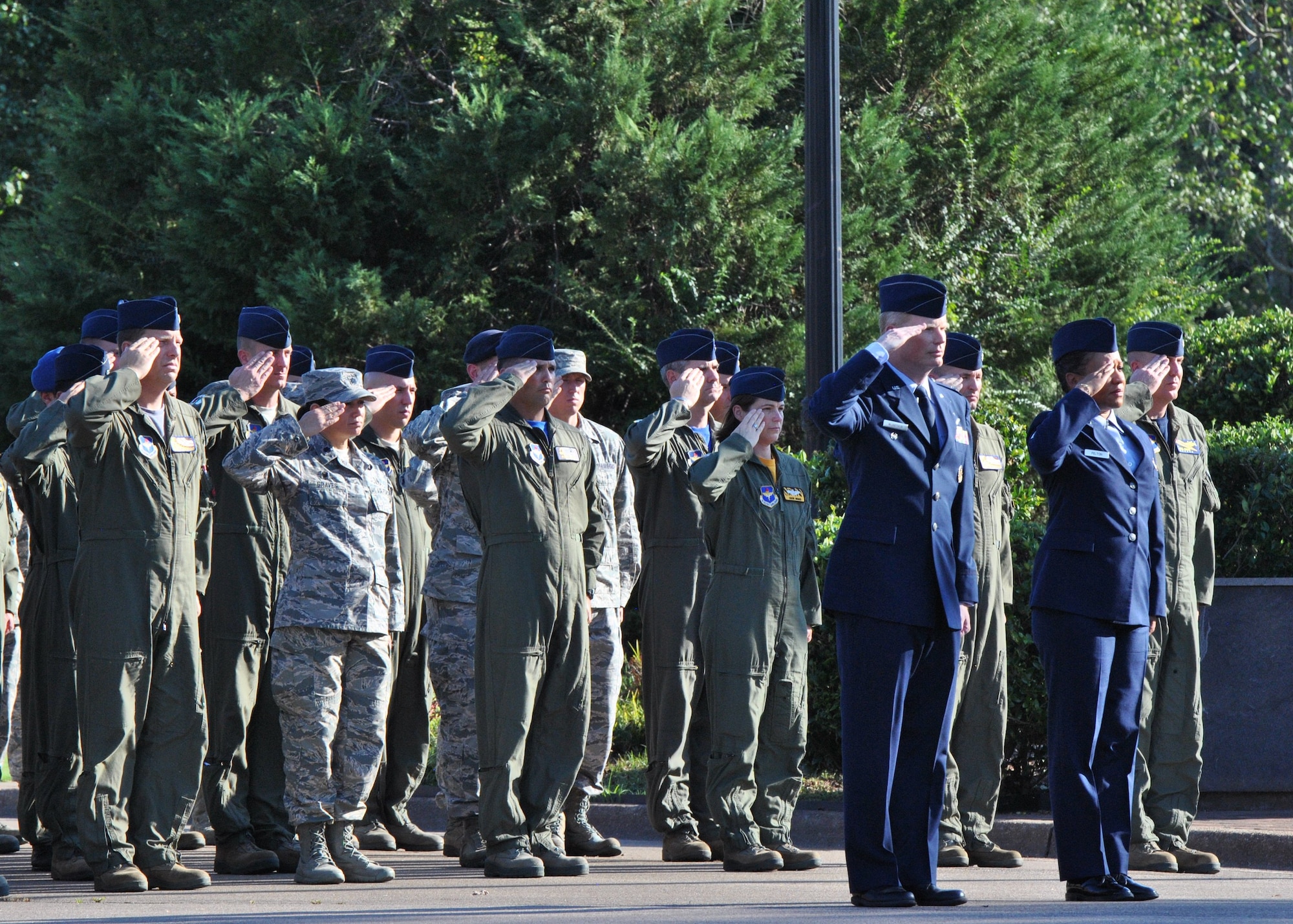 Columbus Air Force Base Airmen salute for the playing of Taps during a memorial service Sept. 19 at Smith Plaza. The service was dedicated to remembering Maj. Richard Schafer, 49th Fighter Trainer Squadron. Shafer was known by his friends and fellow pilots as “Tracer.” He is a decorated Air Force Veteran with over 2,000 flight hours in the F-16 and T-38. (U.S. Air Force photo/Senior Airman Stephanie Englar) 
