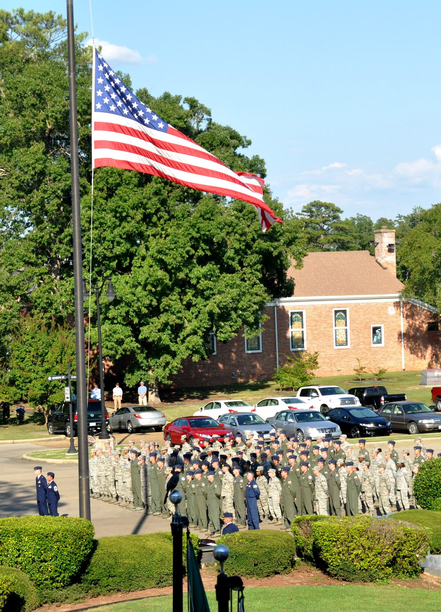 Columbus Air Force Base Airmen stand at attention during a memorial service Sept. 19 at Smith Plaza. The service was dedicated to remembering Maj. Richard Schafer, 49th Fighter Trainer Squadron, who passed away Aug. 31 along with his brother after a personal plane crash in Abilene, Texas. (U.S. Air Force photo/Sonic Johnson)