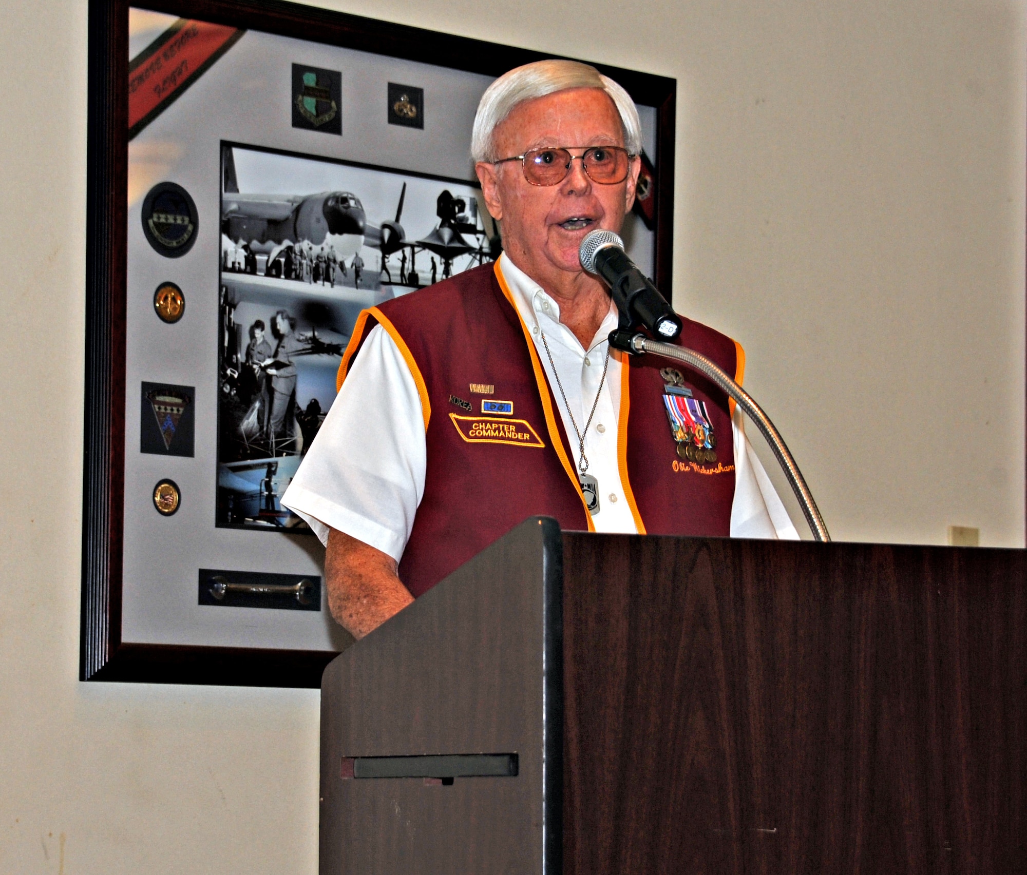 World War II veteran and Korean War POW Obie Wickersham speaks about his battle experiences and time in captivity during a POW/MIA remembrance breakfast as part of National POW/MIA Recognition Day Sept. 19, 2014, at Beale Air Force Base, Calif. Wickersham was captive for 28 months after Chinese forces overran his platoon May 17, 1951. (U.S. Air Force photo by Airman 1st Class Ramon A. Adelan/Released)