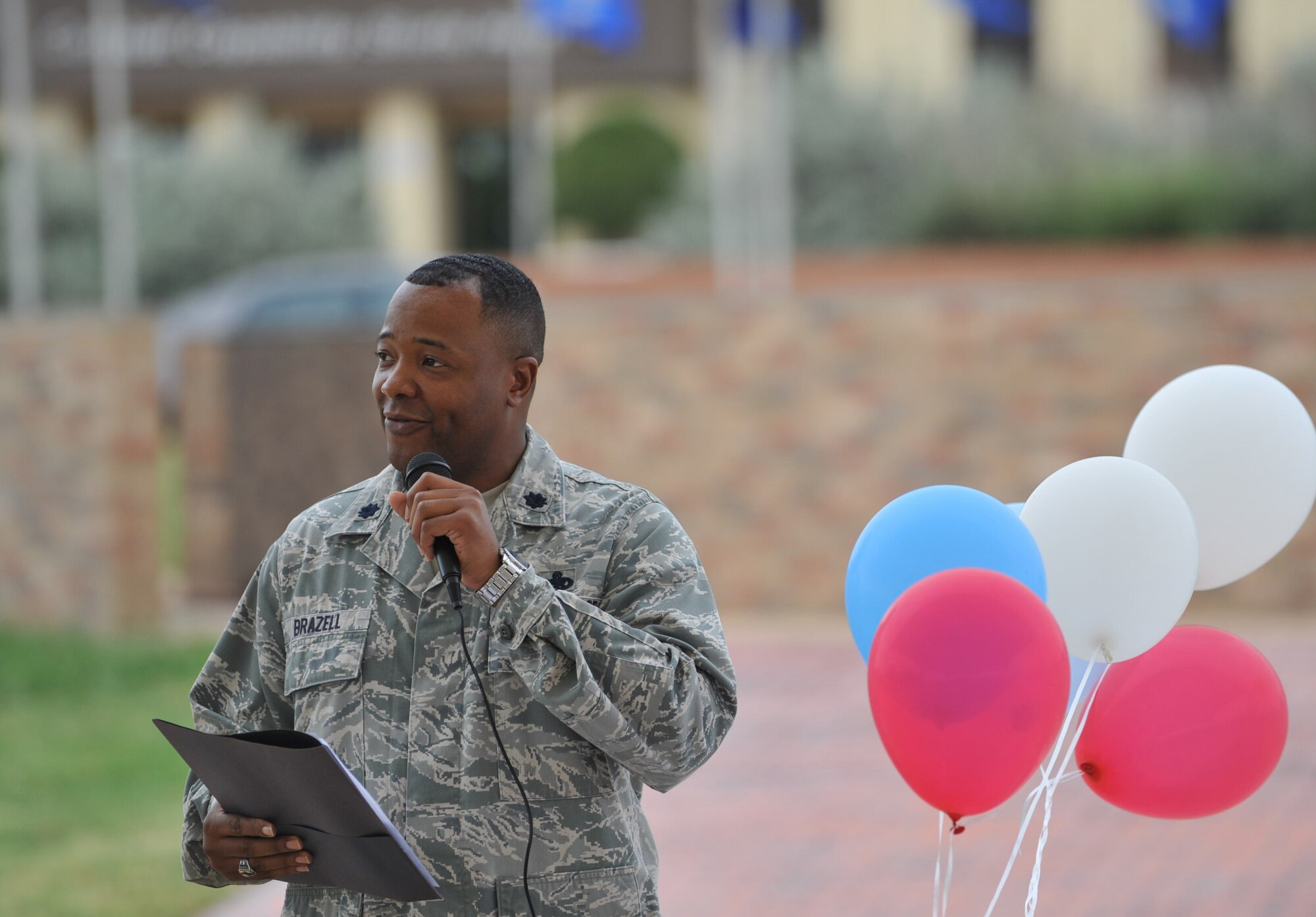 Lt. Col. Marcus Brazell, 82nd Training Group deputy commander, speaks at a cookout hosted by Sheppard’s Rising 6 council Sept. 18, 2014, at the Community Activities Center outdoor pavilion. The cookout style lunch was held to celebrate the Air Force’s 67th birthday. (U.S. Air Force photo/Airman 1st Class Robert L. McIlrath)