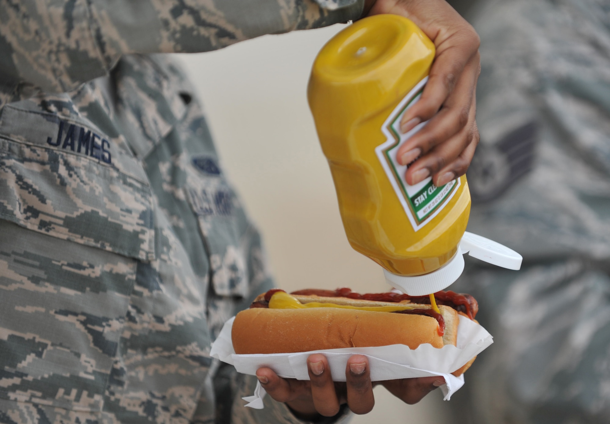 Sheppard’s Rising 6 hosted a cookout style lunch at the Community Activities Center outdoor pavilion Sept. 18, 2014, in honor of the 67th birthday of the U.S. Air Force. The Rising 6 is the junior enlisted council, made up of members from airman basic to tech. sgt. The Rising 6 grilled hundreds of hotdogs, provided flavored shaved ice and a birthday cake for the celebration of a 67-year heritage. (U.S. Air Force photo/Airman 1st Class Robert L. McIlrath)