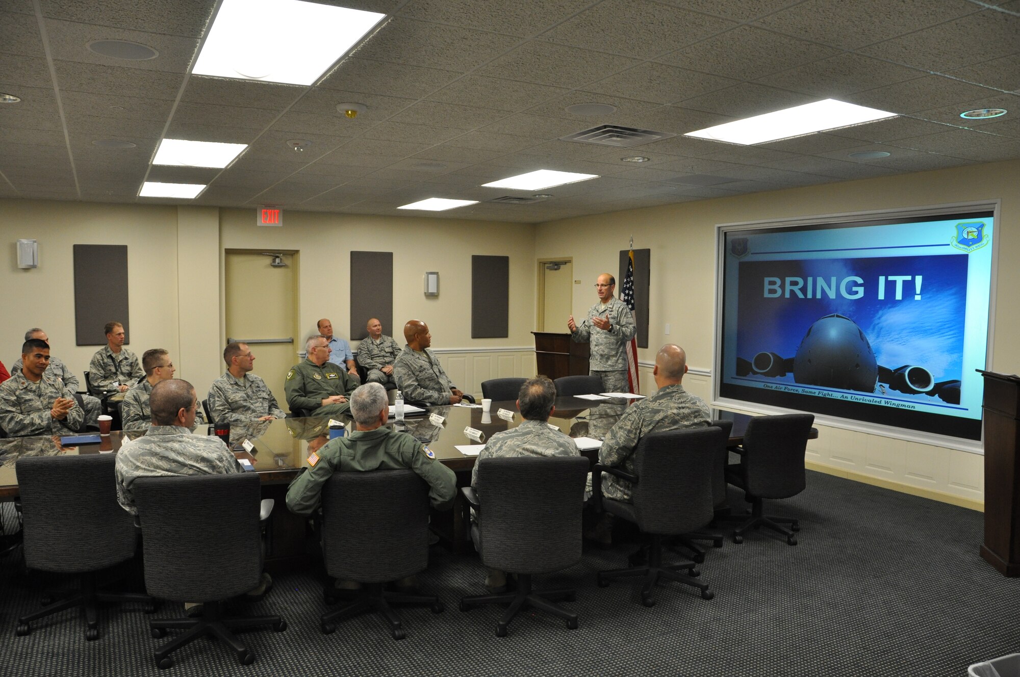 Col. Raymond A. Kozak , 512th Airlift Wing commander, addresses the Air Force Reserve Command Inspection Team here at Dover Air Force Base, Del., as part of the wing's Unit Effectiveness Inspection Sept. 18-23 2014. Functional area experts are evaluating the four major graded areas:  Managing Resources; Improving the Unit; Leading People and Executing the Mission. (U.S. Air Force photo/Staff Sgt. Mercedes Crossland)