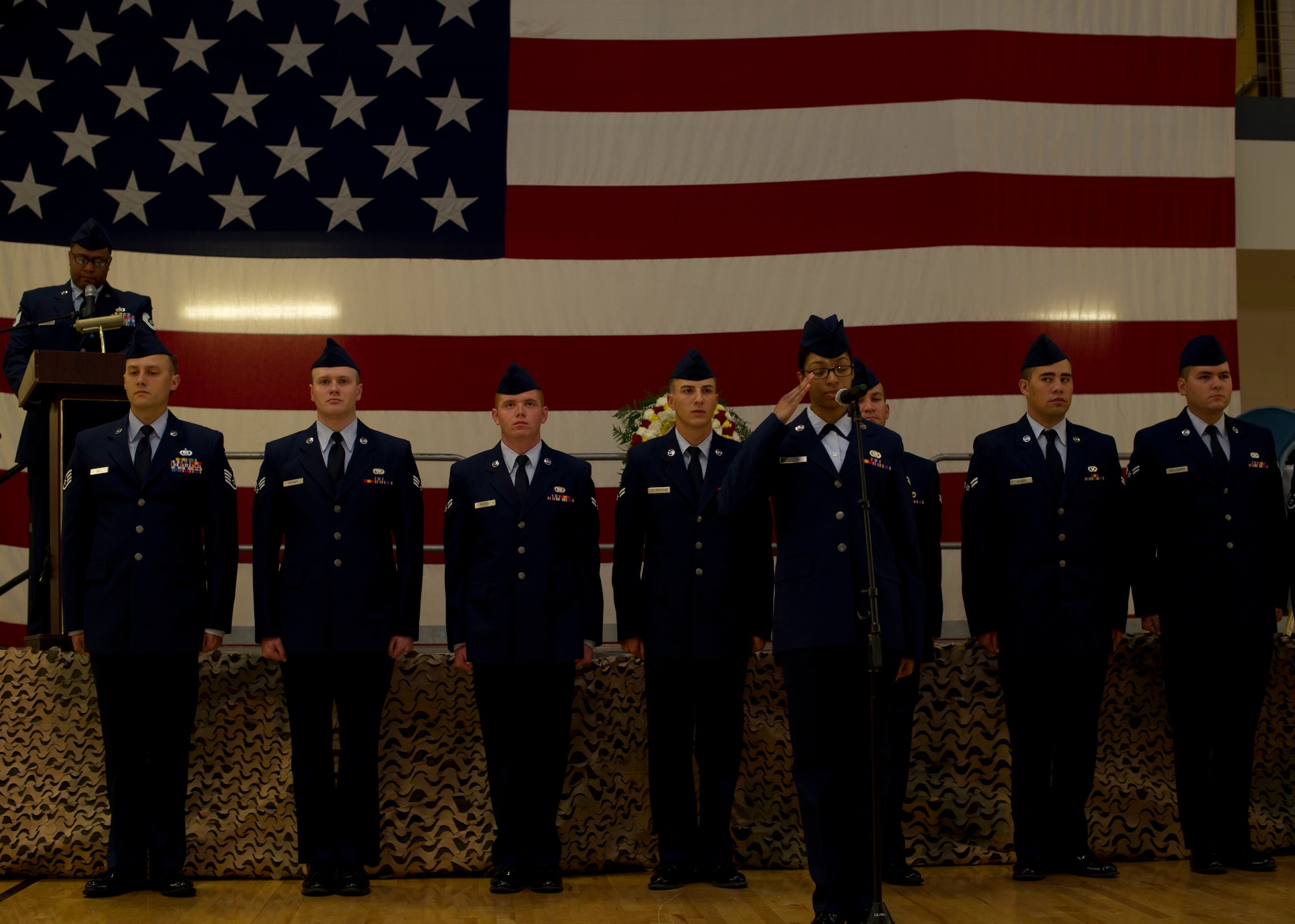 Members of Team Holloman stand in formation for a roll of honor to represent the number of New Mexico residents who are Prisoners of War, or still Missing in Action during the Day of Remembrance ceremony at Holloman Air Force Base, N.M., Sept. 19. Airmen spoke the names and rendered a salute honoring the 12 service members from New Mexico who never returned home. “We need to always remember the sacrifices of those that have gone before us,” said Col. Robert Kiebler, 49th Wing commander. “We will never forget, and we will never rest until all of those accounted for are returned home.” (U.S. Air Force photo by Senior Airman Leah Ferrante/Released)