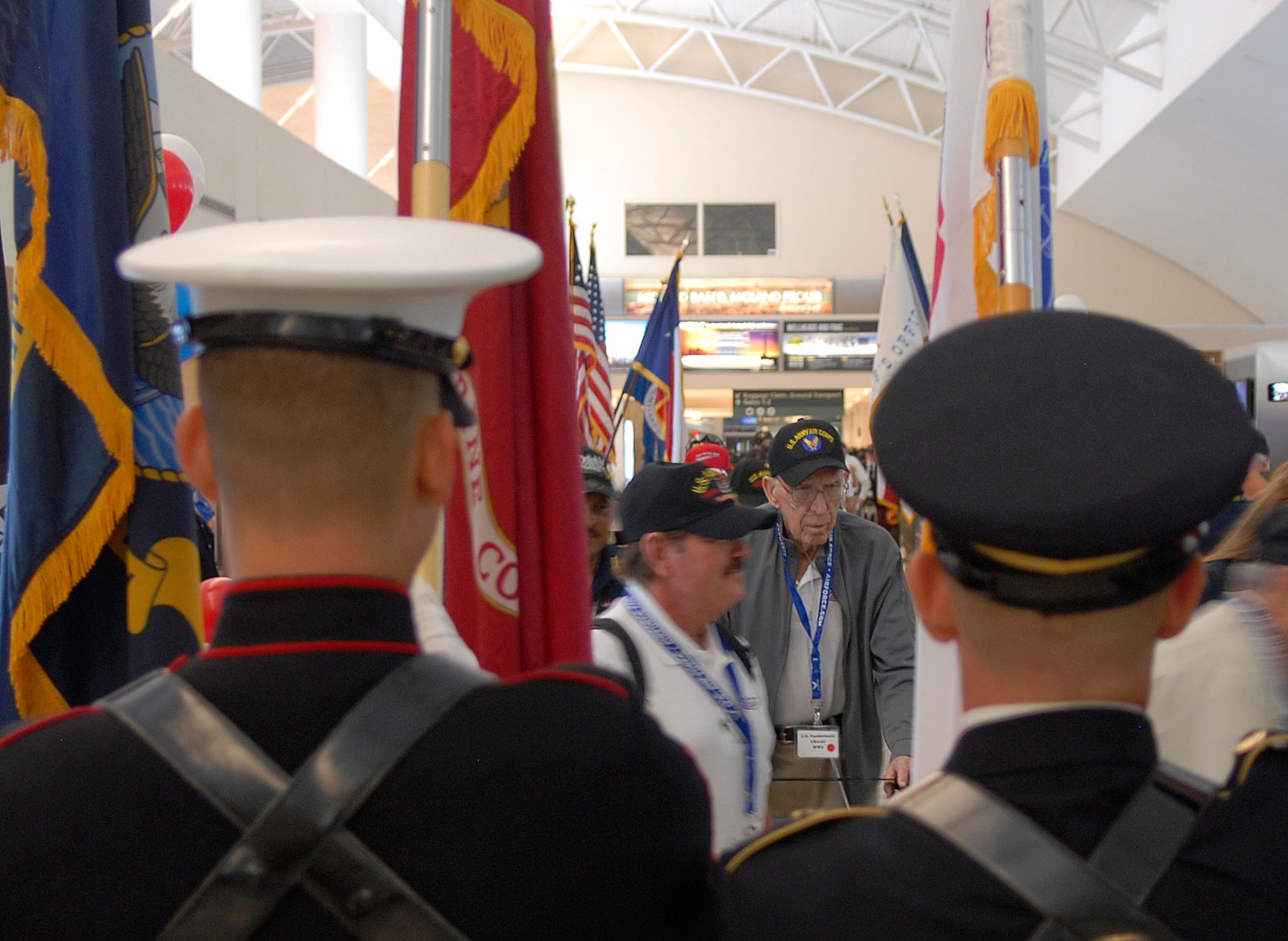 MIDLAND, Texas – The Goodfellow Joint Service Color Guard presents the colors during a sendoff at the Midland International Airport for veterans visiting Washington, D.C. as part of a program put on by the Texas Permian Basin Honor Flight Sept. 17. The Color Guard honored 97 veterans as they went for a three day trip to see war memorials and meet government officials. (U.S. Air Force photo/ 1st Lt. Nathaniel Roesler)