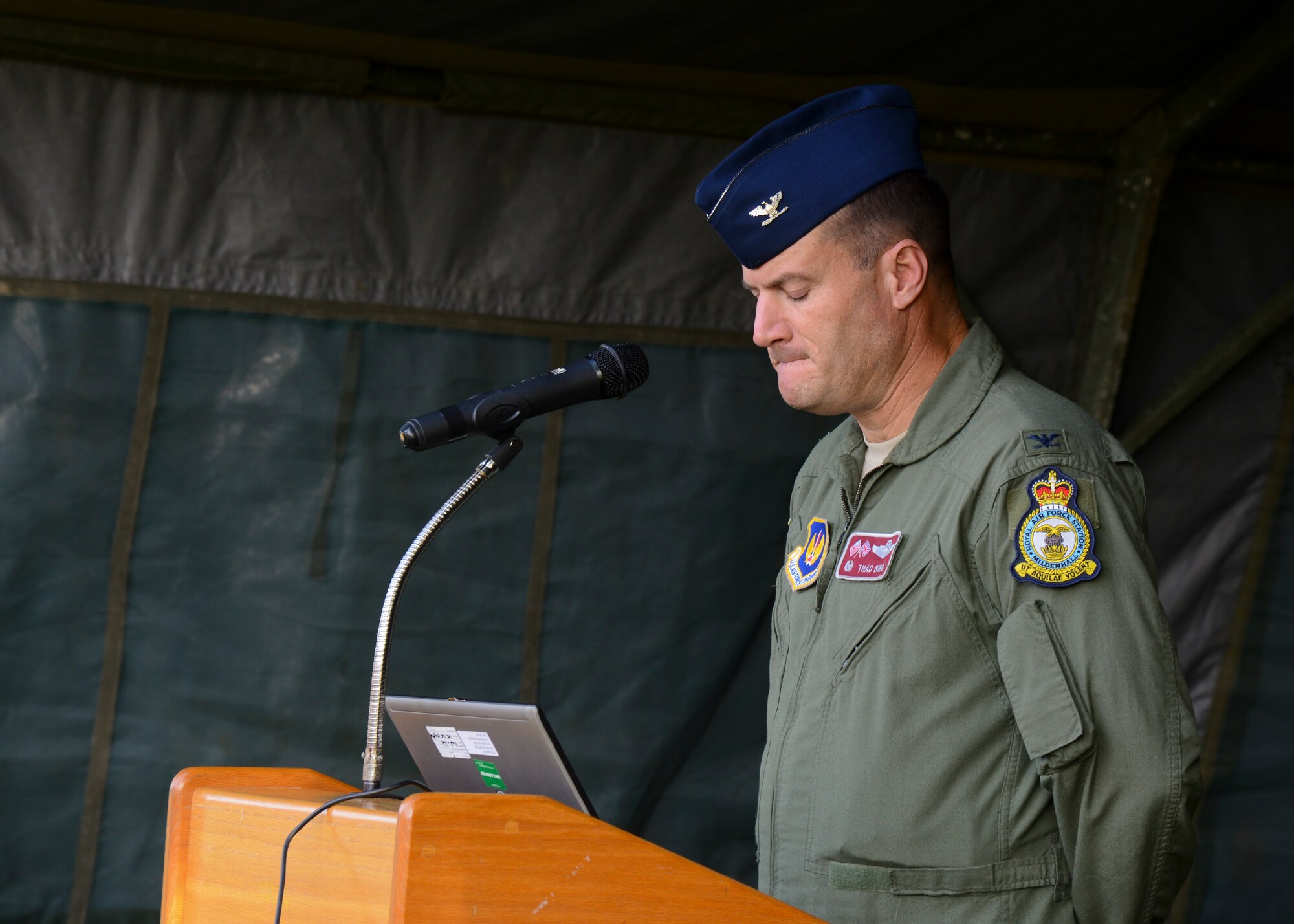 U.S. Air Force Col. Kenneth T. Bibb Jr., 100th Air Refueling Wing commander, pauses while reading names of America’s prisoners of war and missing in action during the POW/MIA 24-hour vigil Sept. 18, 2014, on RAF Mildenhall, England. More than 100 Airmen participated in the vigil honoring the men and women who have sacrificed much in the defense of our country. The nation renewed its promise “You are not forgotten.” (U.S. Air Force photo/Senior Airman Victoria H. Taylor/Released)