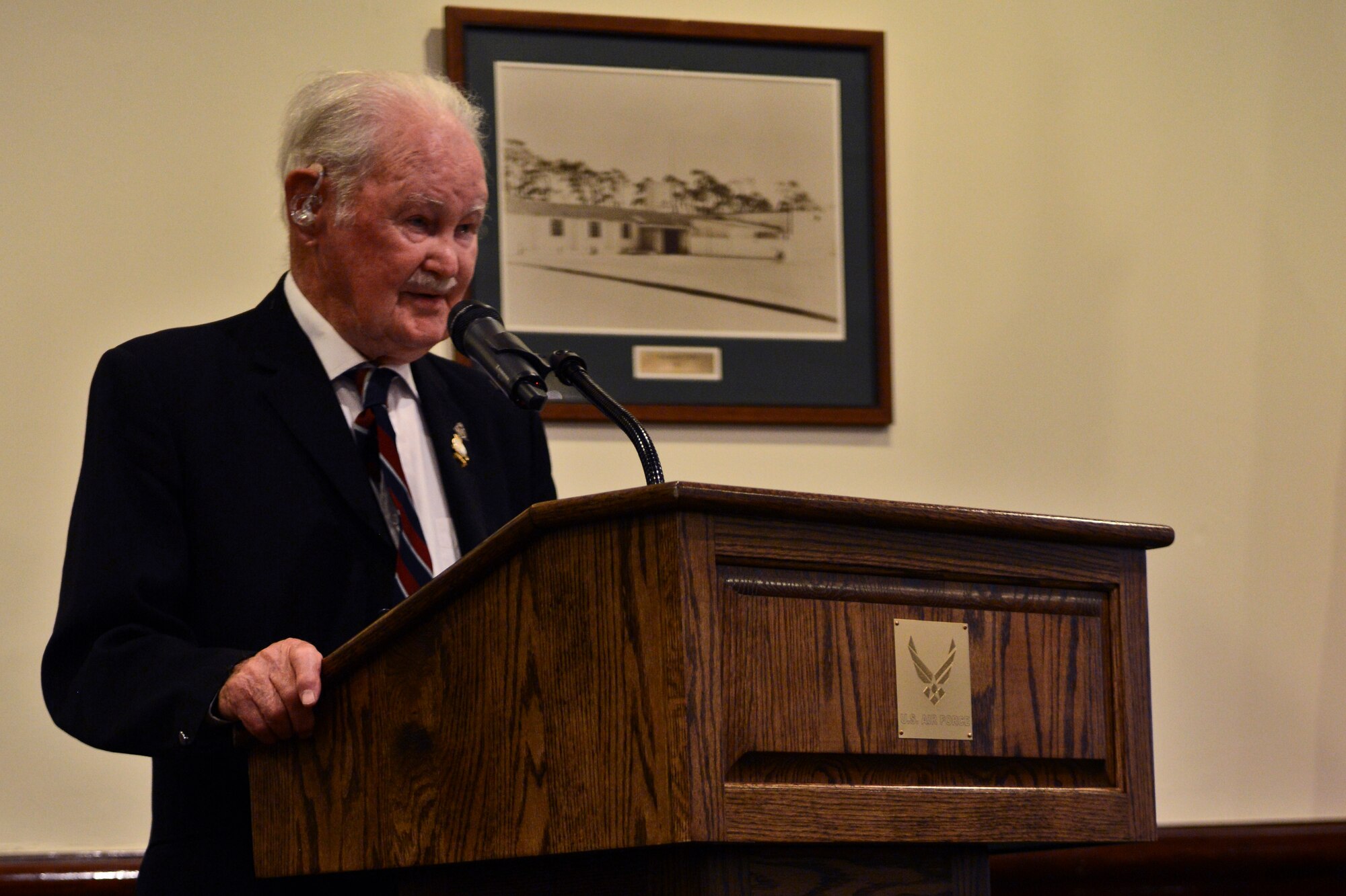 Former Royal Air Force Warrant Officer Norman Gregory addresses the audience at the POW/MIA Recognition Luncheon at RAF Lakenheath, England, Sept. 19, 2014. Gregory completed five operations as a bomb-aimer on Lancaster aircraft during World War II before being taken as a prisoner of war after his plane was shot down during a raid on Dortmund, Germany, May 22, 1944. (U.S. Air Force photo by Airman 1st Class Erin R. Babis/Released)