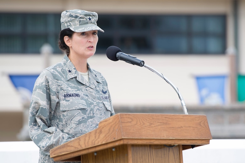 Brig. Gen. Nina Armagno, 45th Space Wing commander, speaks during the 2014 POW/MIA remembrance ceremony, Sept. 19, 2014, at Patrick Air Force Base, Fla. During her speech she said, today, we reaffirm that sacred pledge: ‘You are not forgotten’ and we voice an entire nation’s unending support and our undying promise, that no matter how long it takes, no matter what it takes, we will not stop until we have brought every American home. (U.S. Air Force photo/Matthew Jurgens/Released) 