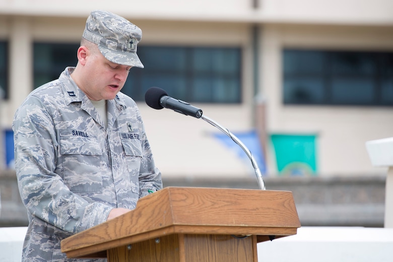 Chaplain (Capt.) Richard “Scott” Savell, 45th Space Wing, opened the POW/MIA remembrance ceremony with an invocation, Sept. 19, 2014 at Patrick Air Force Base, Fla. Since the 2013 National POW/MIA Recognition Day, six Airmen previously unaccounted-for from the Vietnam War were brought home to their families, but there is still much work to be done. (U.S. Air Force photo/Matthew Jurgens/Released)