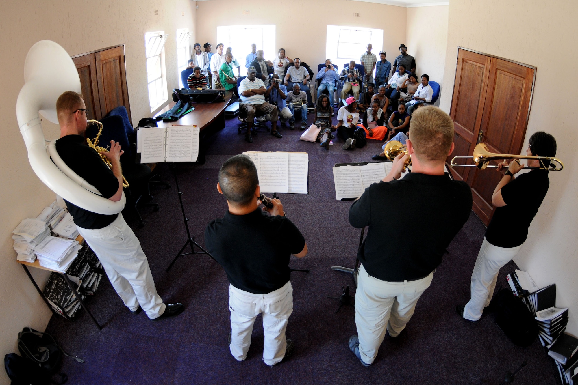Members of the U.S. Air Forces in Europe jazz band, Wings of Dixie, play for music students during a jazz workshop Sept 18, 2014, at the Music Academy of Gauteng in Benoni, South Africa. The band led a music workshop to enhance the student’s knowledge on certain instruments, after which they played a concert for the students. (U.S. Air Force photo/Tech. Sgt. Austin M. May/Released)