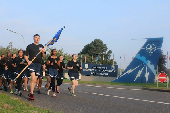 Service members from the 470th Air Base Squadron, Geilenkirchen, Germany, participate in a morale run during a squadron sports day Sept. 12, 2014. Service members from the unit took part in various sporting events including basketball, volleyball, racquetball, football and kickball. (Courtesy photo by U.S. Air Force Staff Sgt. Andrew Caber/Released)