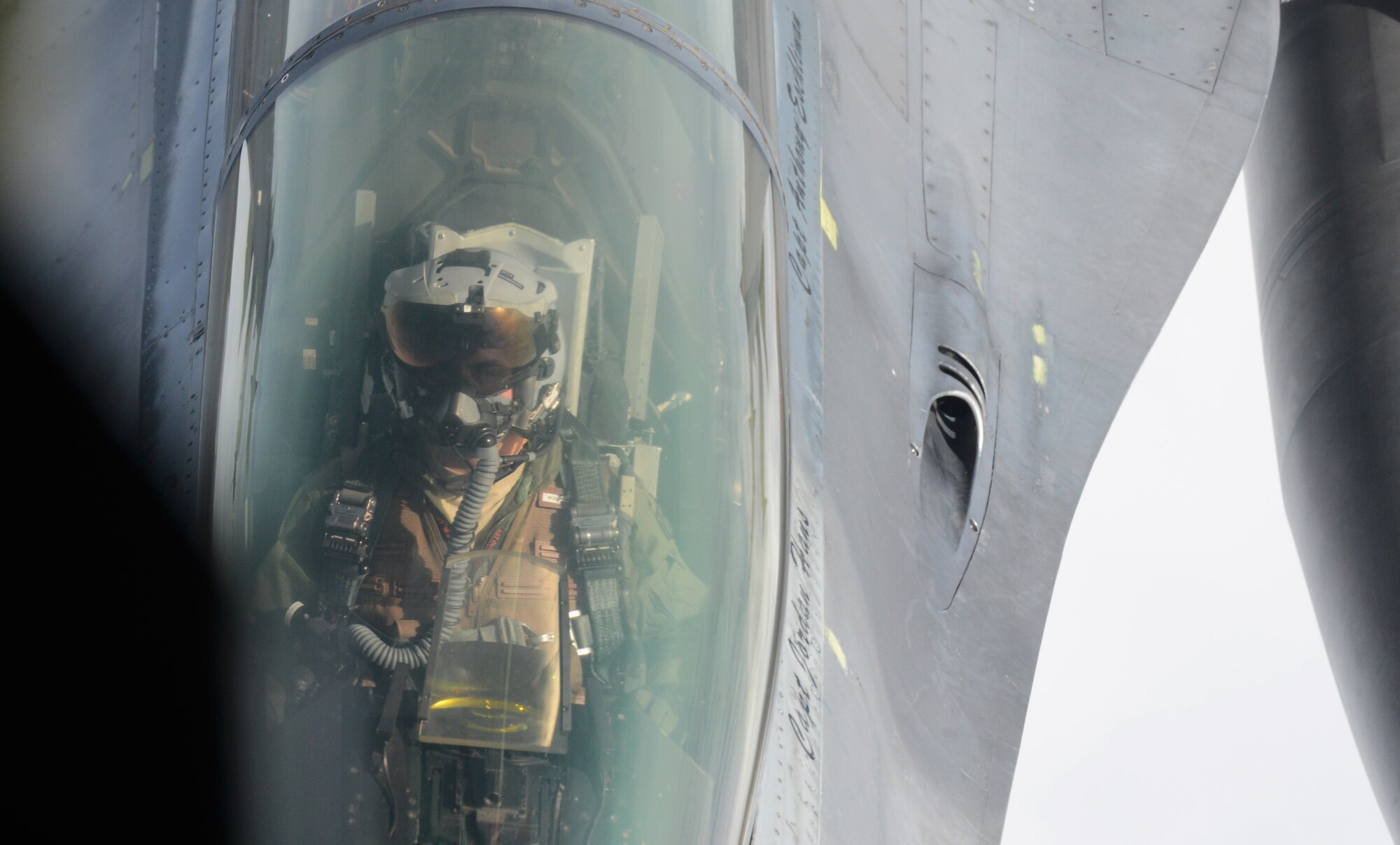 A U.S. Air Force F-16 Fighting Falcon fighter aircraft pilot from the 52nd Fighter Wing closes in on a U.S. Air Force KC-135 Stratotanker to receive fuel during an aerial refueling mission at Spangdahlem Air Base, Germany, Sept. 18, 2014. The F-16 flies within 30 feet of the KC-135 during the refueling process. (U.S. Air Force photo by Airman 1st Class Luke J. Kitterman/Released)