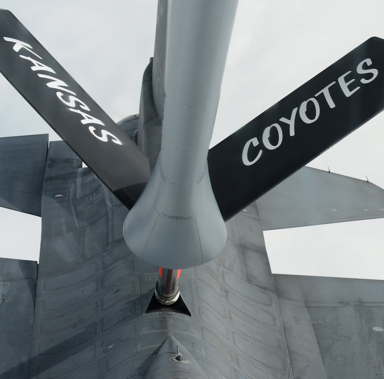 The boom from a U.S. Air Force KC-135 Stratotanker refuels a U.S. Air Force F-16 Fighting Falcon fighter aircraft during an aerial refueling mission at Spangdahlem Air Base, Germany, Sept. 18, 2014. The 117th Air Refueling Squadron based out of Topeka, Kan., maintains the KC-135. (U.S. Air Force photo by Airman 1st Class Luke J. Kitterman/Released)