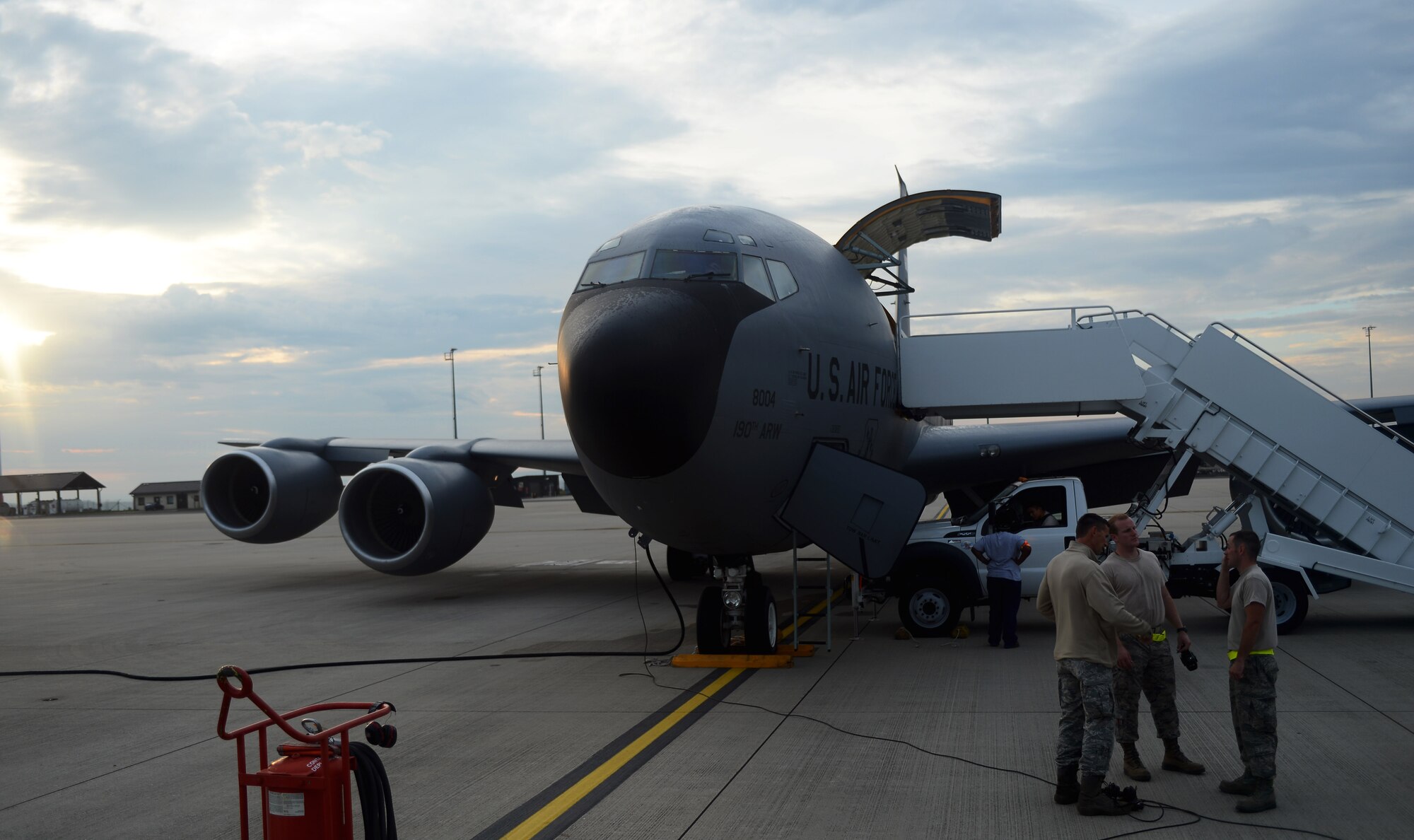 A U.S. Air Force KC-135 Stratotanker, assigned to the 117th Air Refueling Squadron in Topeka, Kan., gets prepared by Airmen for an aerial refueling mission with U.S. Air Force F-16 Fighting Falcon fighter aircraft at Spangdahlem Air Base, Germany, Sept. 18, 2014. The KC-135 replaced the U.S. Air Force KC-97 Stratotanker in 1957 and represents the U.S. Air Force's first jet-powered refueling tanker. (U.S. Air Force photo by Airman 1st Class Luke J. Kitterman/Released)