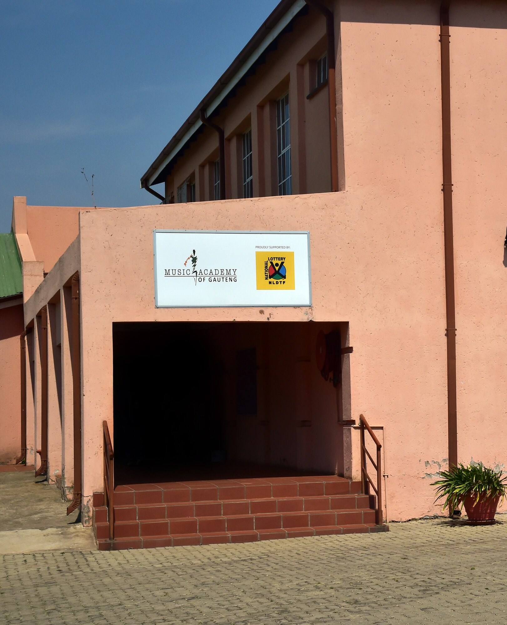 The entrance of the Music Academy of Gauteng in Benoni, South Africa, where the U.S. Air Forces in Europe jazz band, Wings of Dixie, gave nearly 150 music students a free, live concert, Sept 18, 2014. (U.S. Air Force photo/Staff Sgt. Travis Edwards-Released)