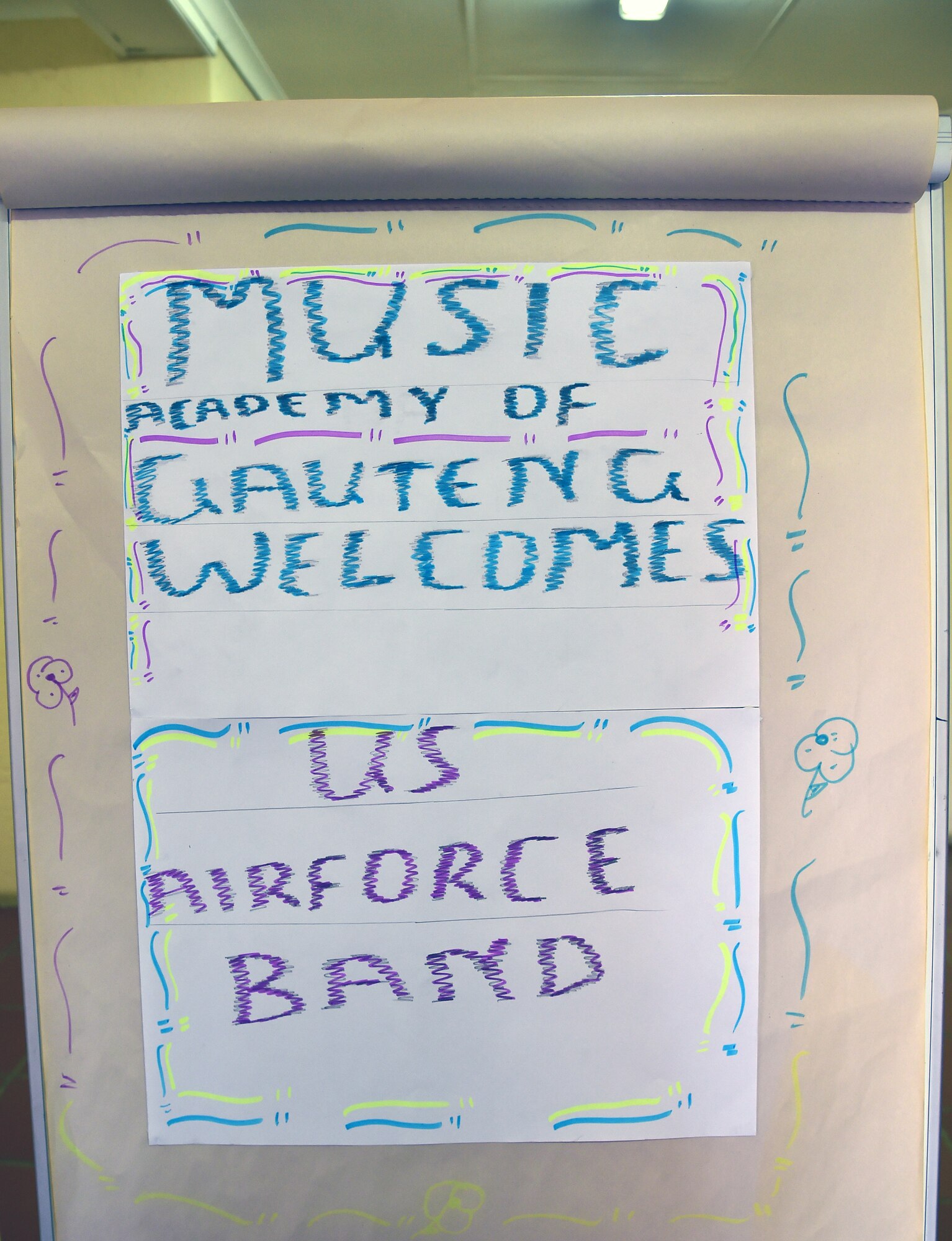 A sign welcoming the U.S. Air Forces in Europe jazz band, Wings of Dixie to the Music Academy of Gauteng in Benoni, South Africa, Sept 18, 2014. The Jazz band gave nearly 150 music students a free, live concert and a two-hour musical workshop aimed at helping the students develop their talent in various musical instruments. (U.S. Air Force photo/Staff Sgt. Travis Edwards-Released)