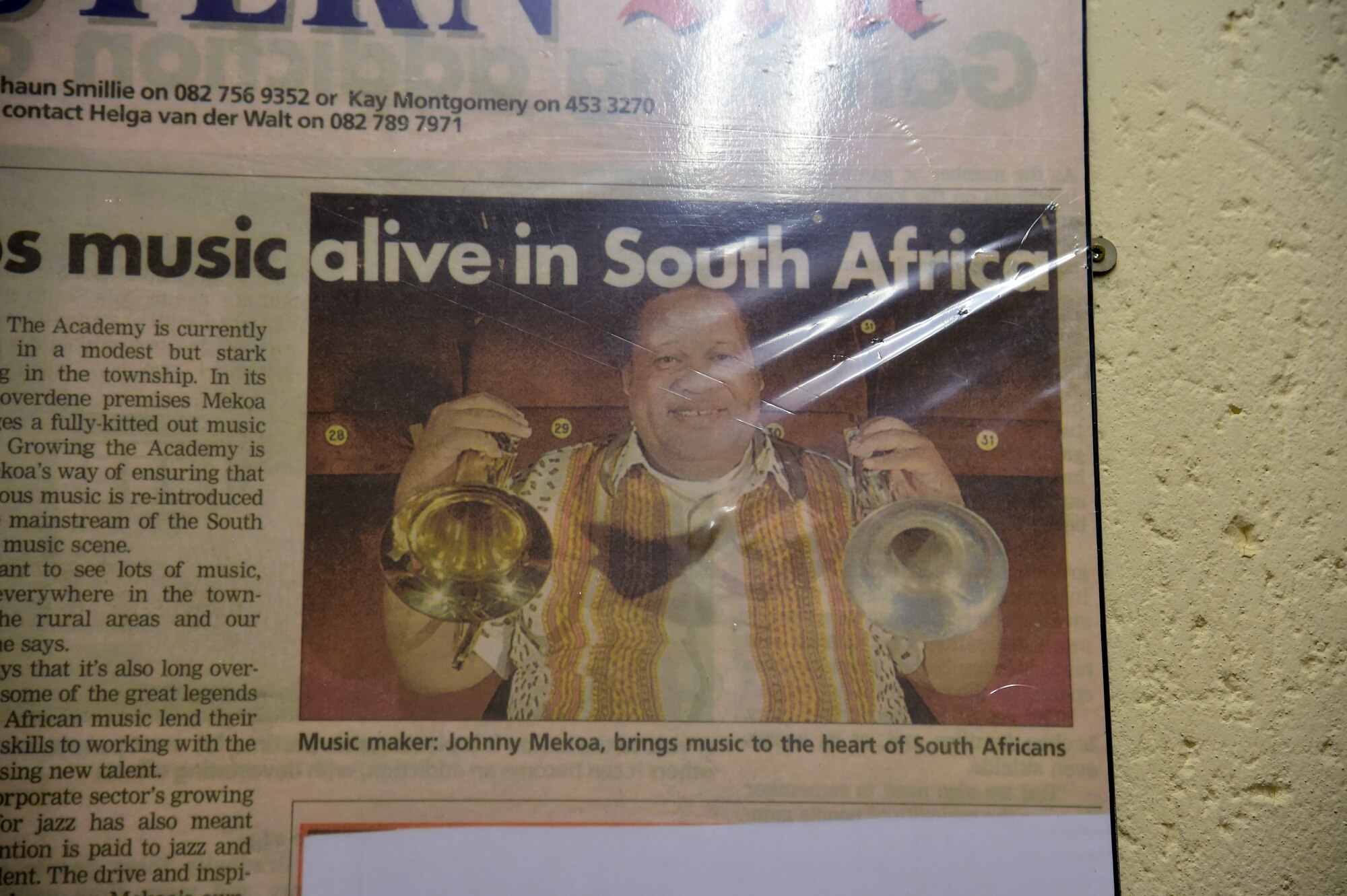 A news clipping of founder and director of the Music Academy of Gauteng in Benoni, South Africa, Sept. 18, 2014 Johnny Mekoa. Mekoa is a renowned trumpeter in South Africa and teaches young students how to love and appreciate music. (U.S. Air Force photo/Staff Sgt. Travis Edwards-Released)