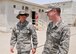 Air Force Master Sgt. James Nielsen and Air Force Senior Airman Erik Winter discuss goals for Winter’s mentorship program as they walk across base at the 380th Air Expeditionary Wing August 23. The two are participating in the wing’s “Adopt an Airman” program at an undisclosed location in Southwest Asia. (U.S. Air National Guard photo by Senior Master Sgt. Eric Peterson/Released)