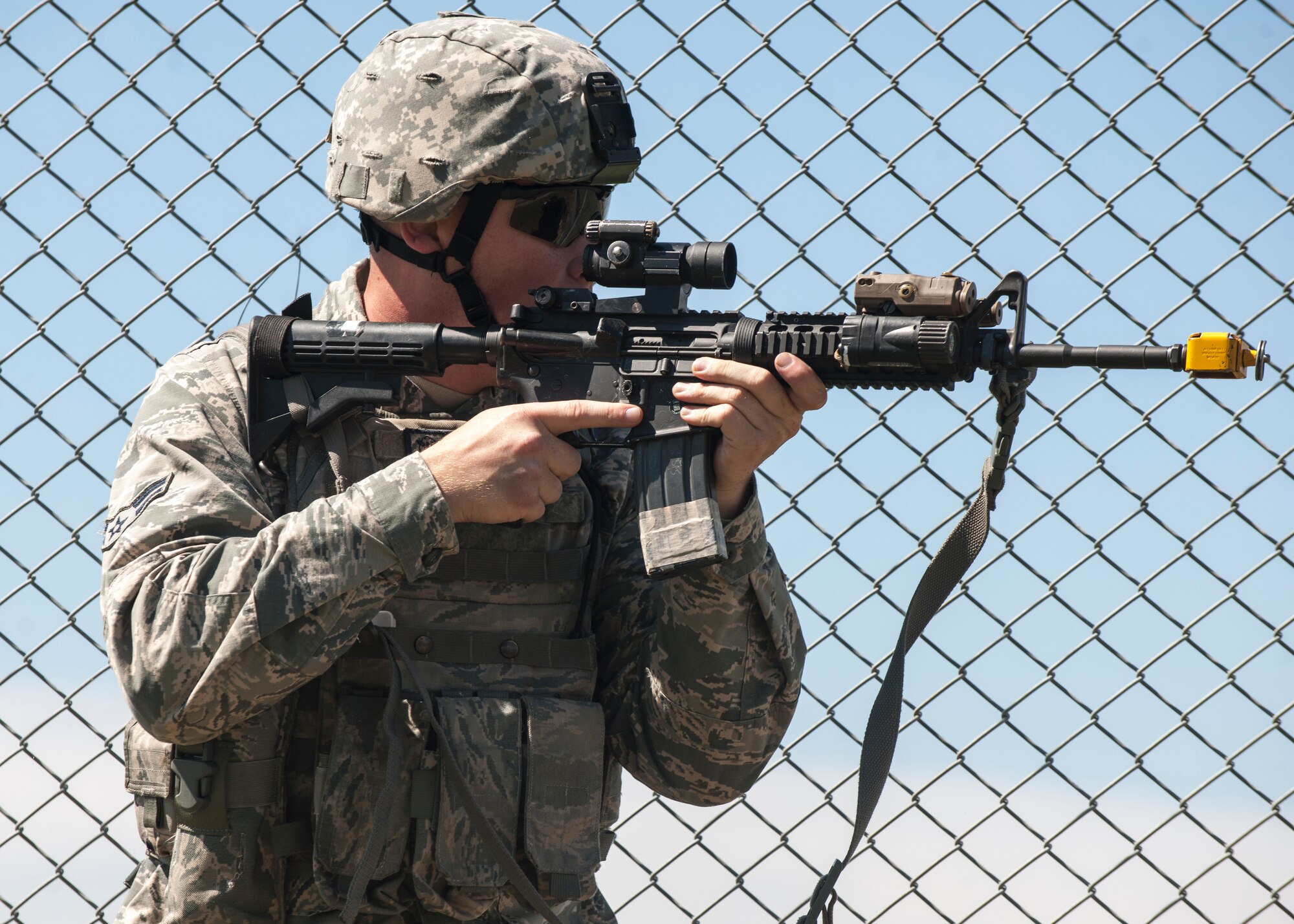A Wolf Pack defender provides security Sept. 16 as part of quarterly combat readiness training at Kunsan Air Base, Republic of Korea. Integrating Airmen of all ranks – from airmen basic to company grade officers – with Republic of Korea Air Force members in quarterly CRTs helps instill a mindset of teamwork to ultimately ensure maximum security and safety of the Wolf Pack family. (U.S. Air Force photo/Senior Airman Katrina Heikkinen)