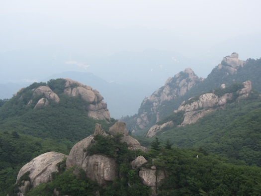 A view of the famous granite peaks of the Sobaeksanmaek Mountains, 
pictured here June 17, 2014, Songnisan National Park, Chungcheongbuk Province, 
Republic of Korea. The fog and haze limited the visibility of the mountains, 
however it provide some protection from the hot sun. (Courtesy photo by 
Staff Sgt. Joshua Johnson)
