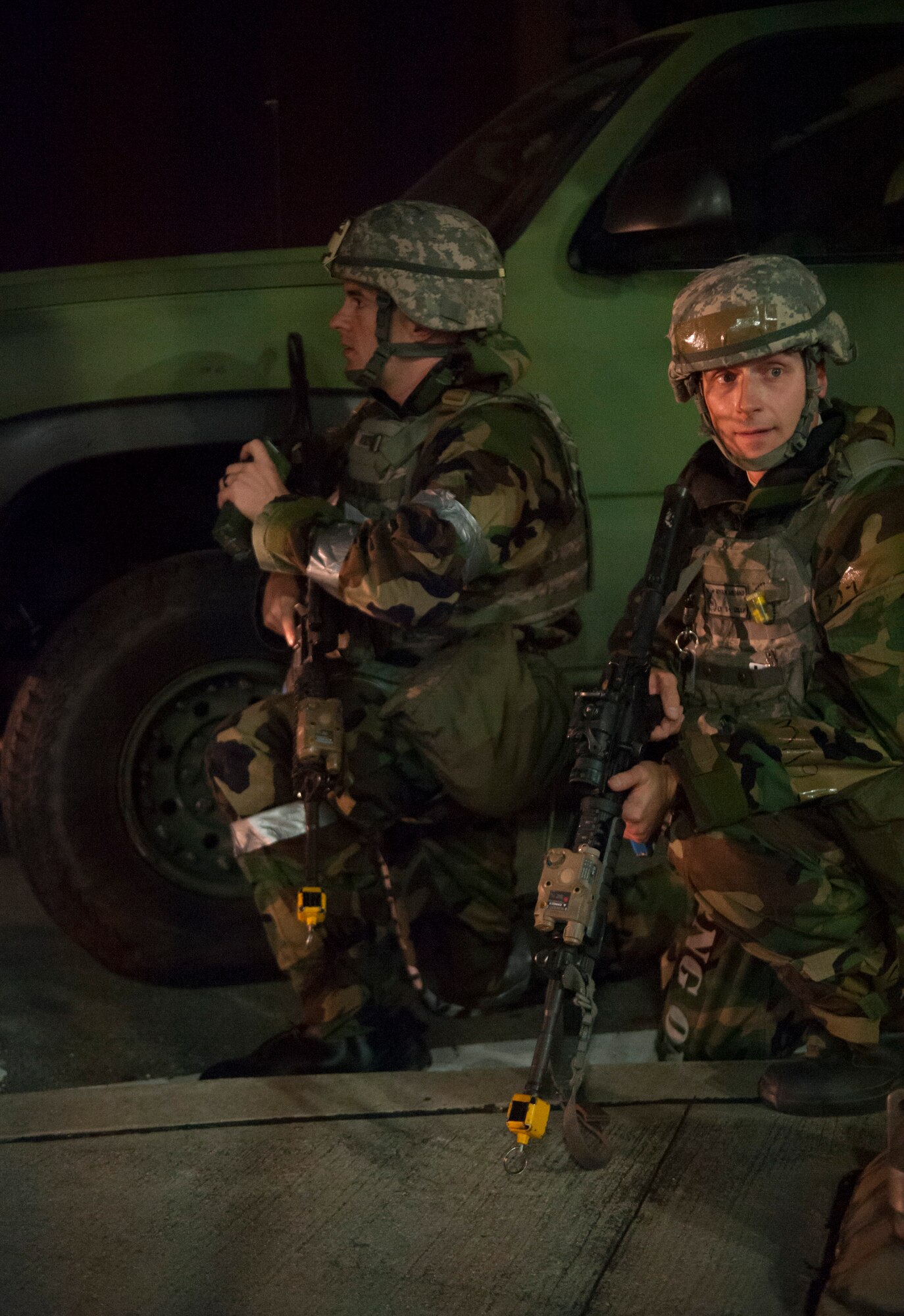 Members from the 51st Security Forces Squadron radio for assitance during Operational Readiness Exercise Beverly Midnight 14-4 Sept. 17, 2014, at Osan Air Base, Repubic of Korea. Exercises like BM 14-4 test Airmen on their ability to operate and accomplish the mission during war-time contingency operations. (U.S. Air Force photo by Senior Airman Matthew Lancaster)