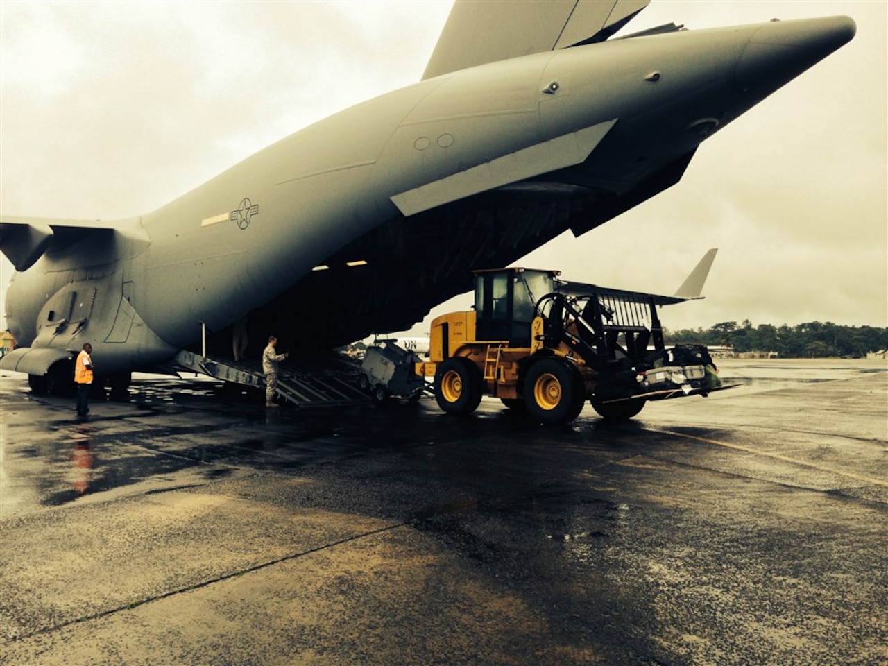 A U.S. C-17 Globemaster III transport jet arrives in Liberia with the first shipment of increased U.S. military equipment and personnel for the anti-Ebola fight, Sept. 18, 2014. State Department photo