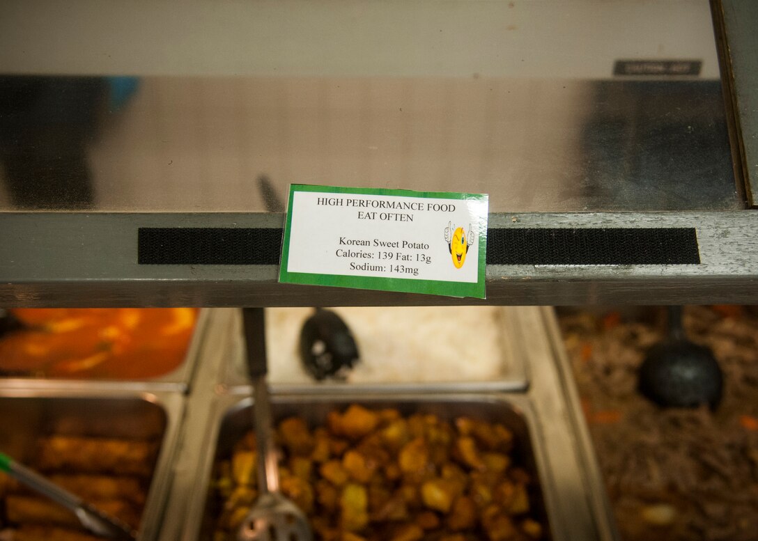 A card showing the nutrition facts of the food below is displayed at the dining facility at Kunsan Air Base, Republic of Korea, Sept. 16, 2014. The cards are a part of the “Go for Green” nutrition service that the DFAC has to offer to its customers. (U.S. Air Force photo by Senior Airman Taylor Curry/Released) 